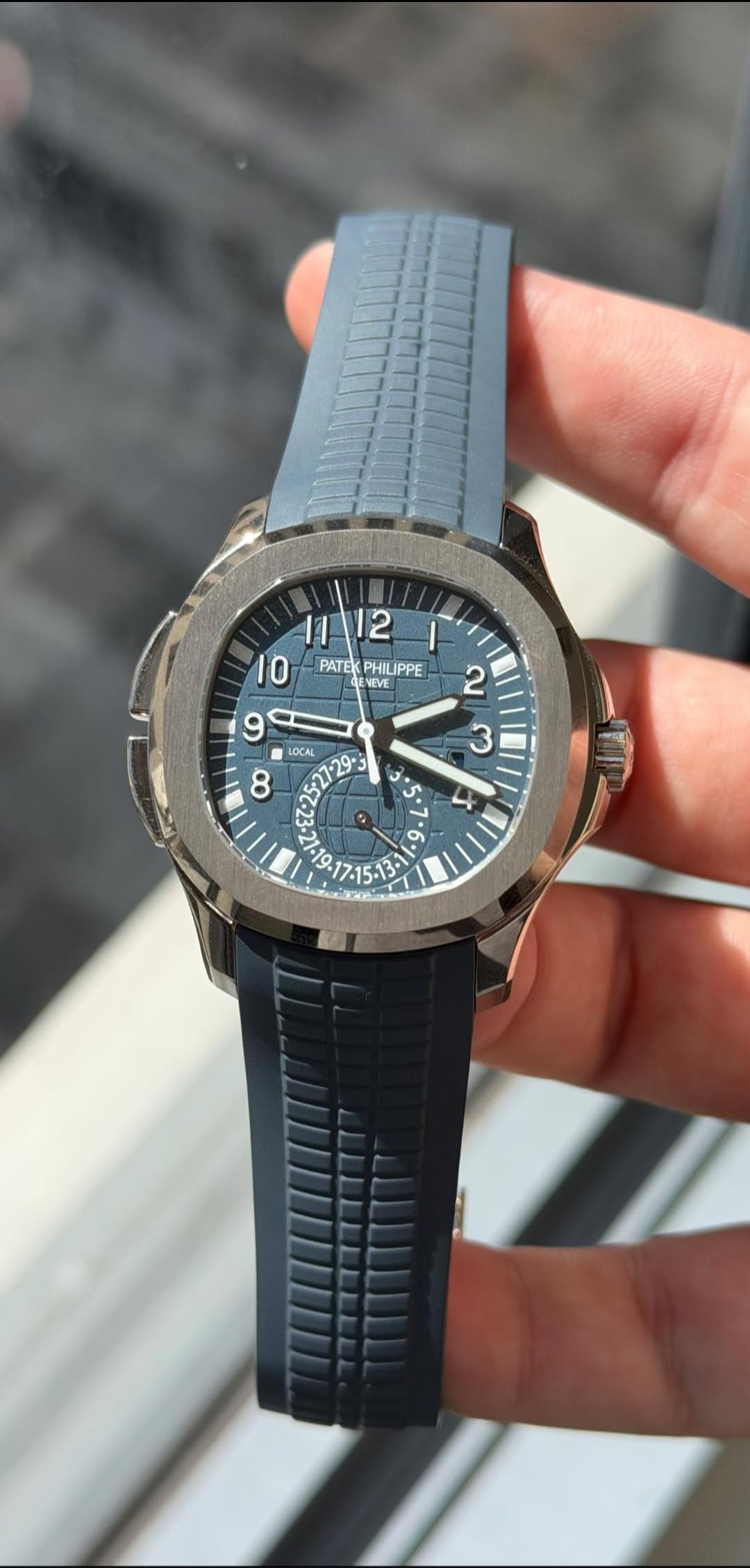 May be an image of digital watch and text that says 'Il PATEK PHILIPPE IPPE GEN ENEM ENEVE 2 9 LOCAL 8 *3 تن け ب 19 21፡19 و 9 زبر . y'