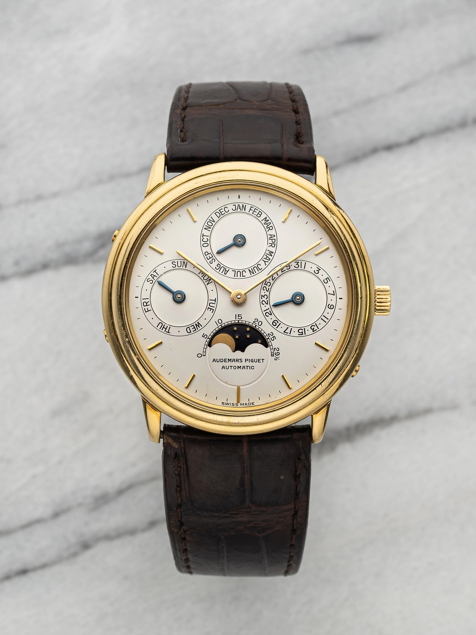 May be an image of wrist watch and text