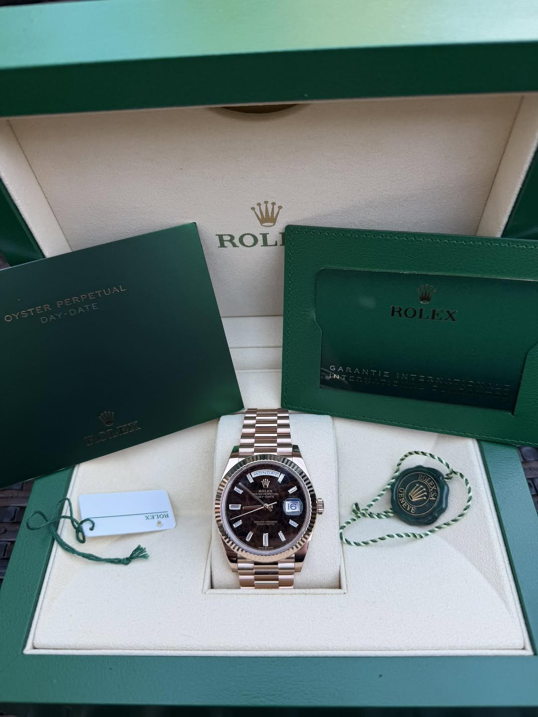 May be an image of wrist watch and text