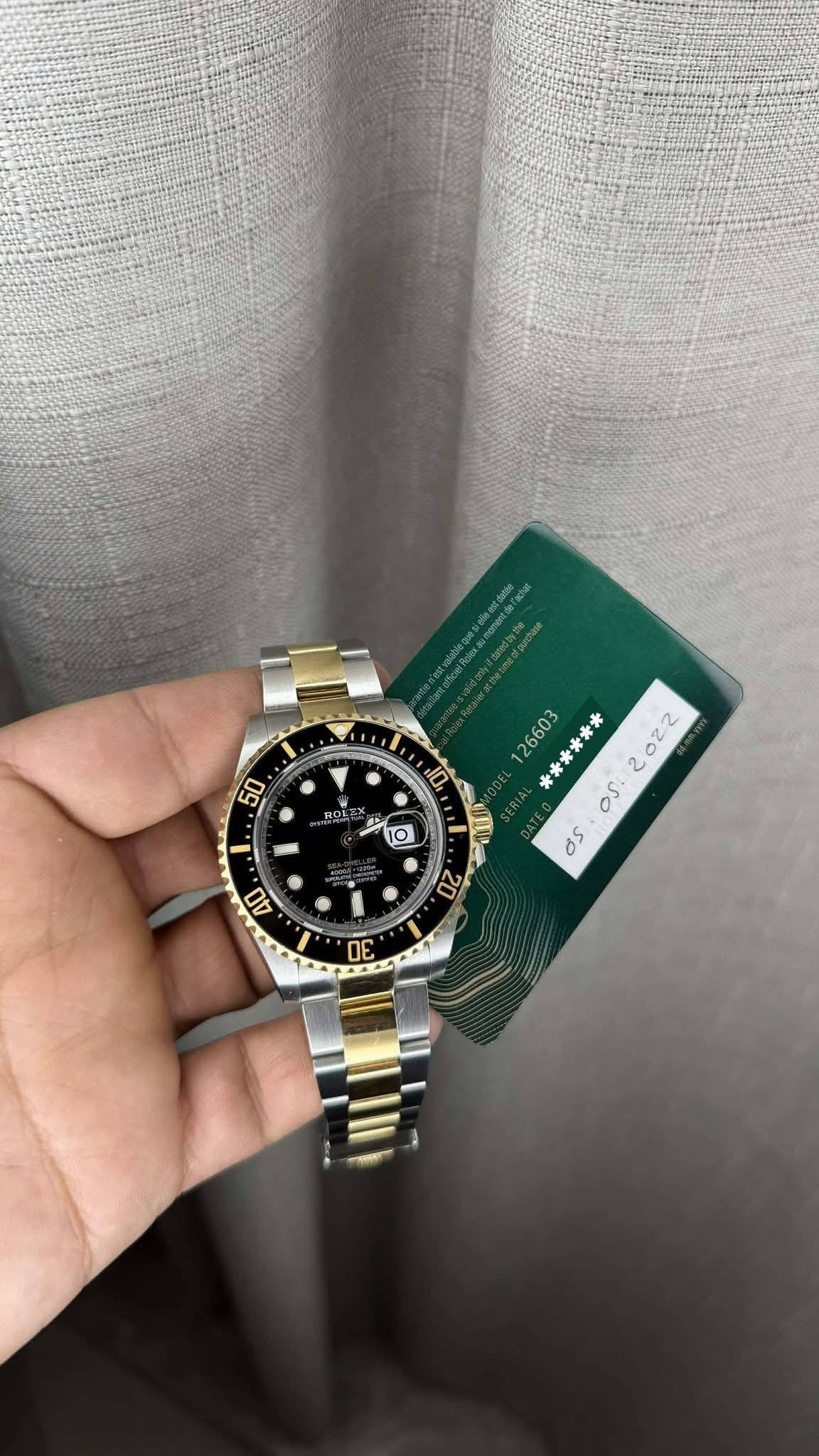 May be an image of wrist watch and text that says '- - 0 ร 50 0 RON জ ፍክስ 10 O 26603 米***** 2 022 os. os 40 ne ค'