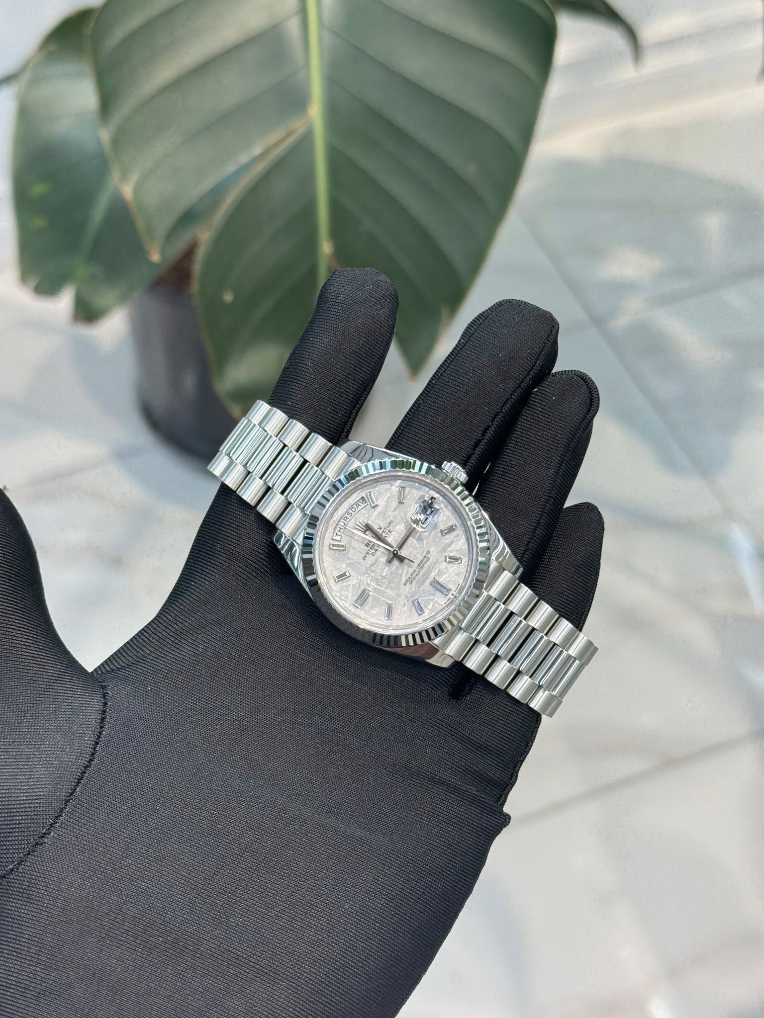 May be an image of wrist watch and text