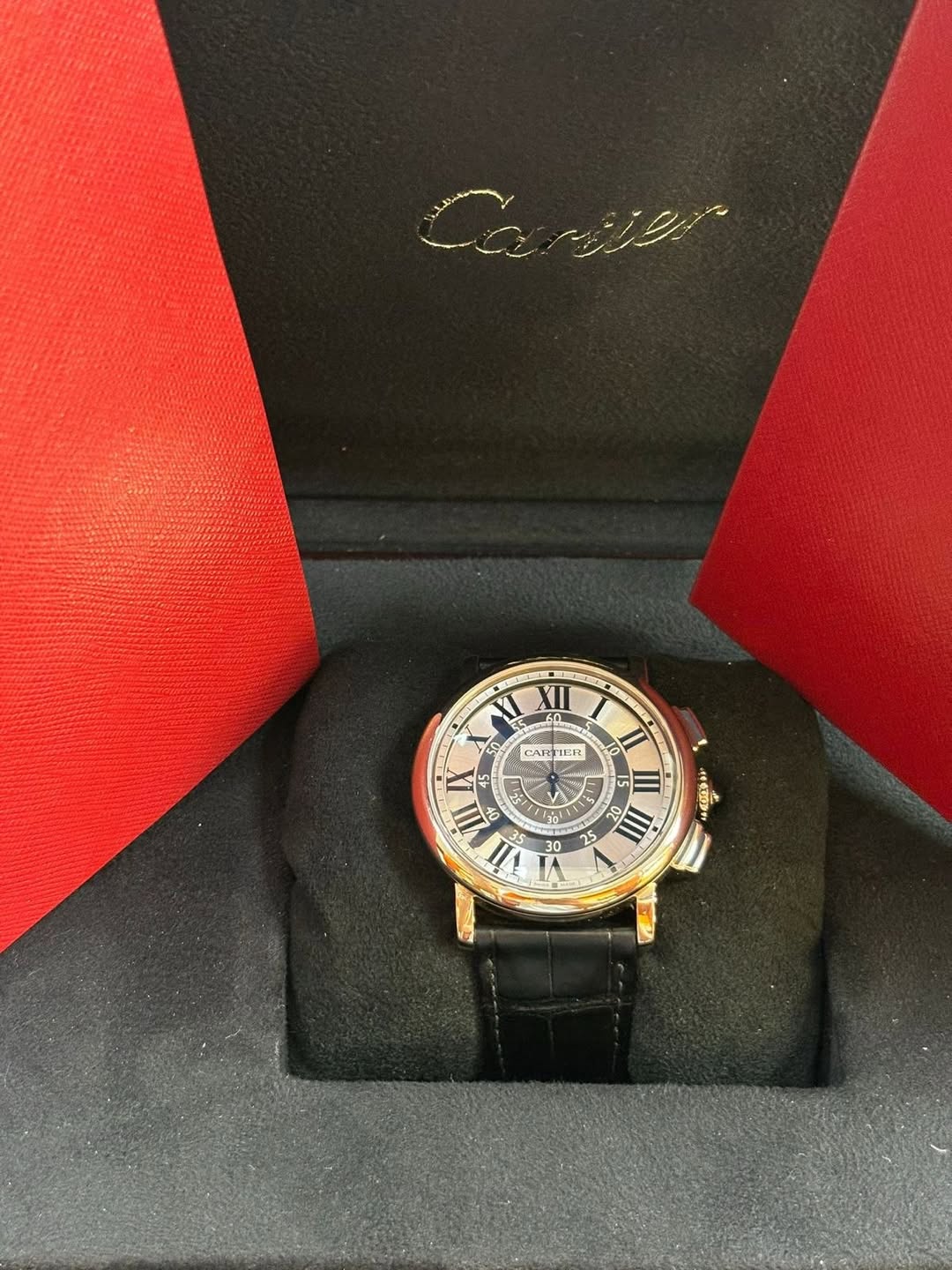 May be an image of wrist watch and text that says 'T CART CARTIER IER 0 LA III ء ሕ 30 1 0Z III III VI - 30 55'