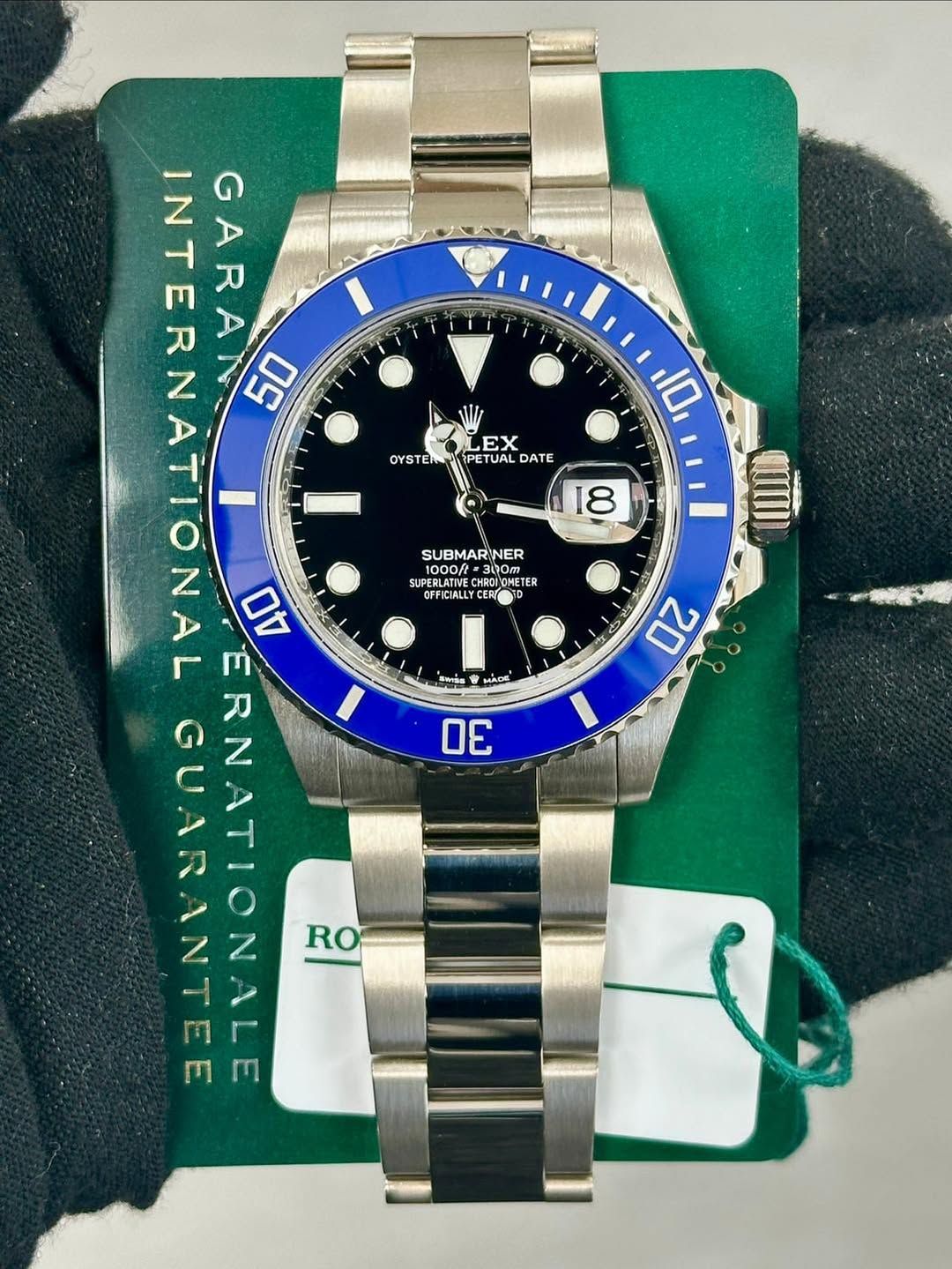May be an image of wrist watch and text that says 'OYSTER EX yPE ETUAL DATE 10 8 SUBMARINER 1000fl= CHRRNET 1300m. வளம SUPERLATIVE CHRNE CHROCMETER TER CIALLY 0 C 20 WISE MAA 30…