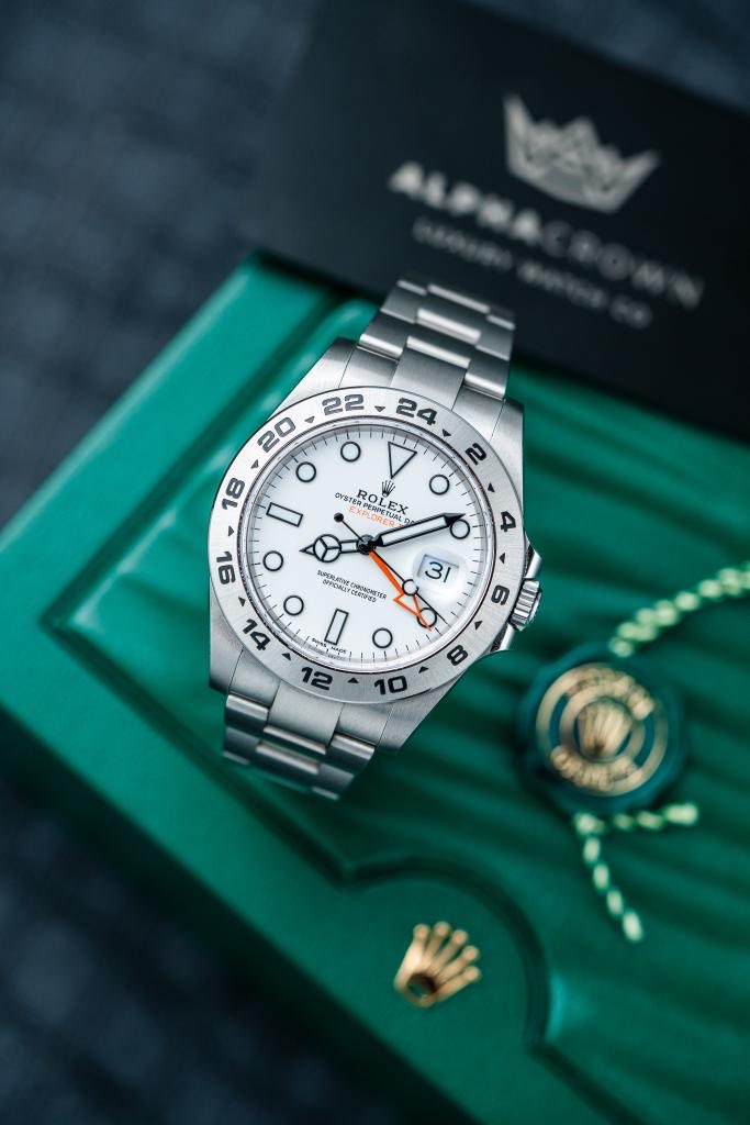 May be an image of wrist watch and text
