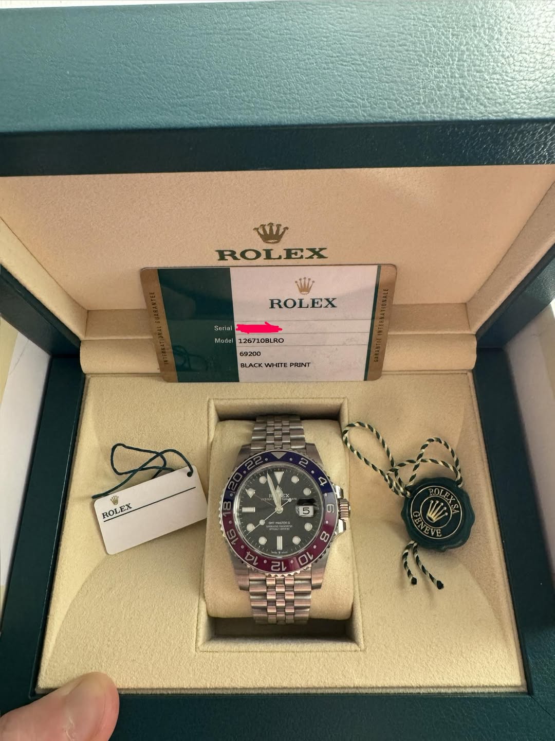 May be an image of wrist watch and text that says 'ححکك ROLEX ROLEX Sorlai Mudel 126710BLRO 69200 BLACKWHITEPRUINT WHITE PRINT BLACK ® Y i ROLEX LEX プ S 5 သ 中とIつ 6 言 MI 8 10…
