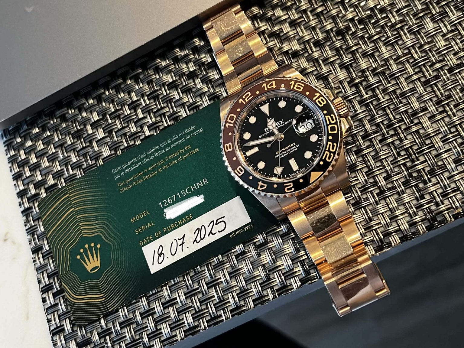 May be an image of wrist watch and text