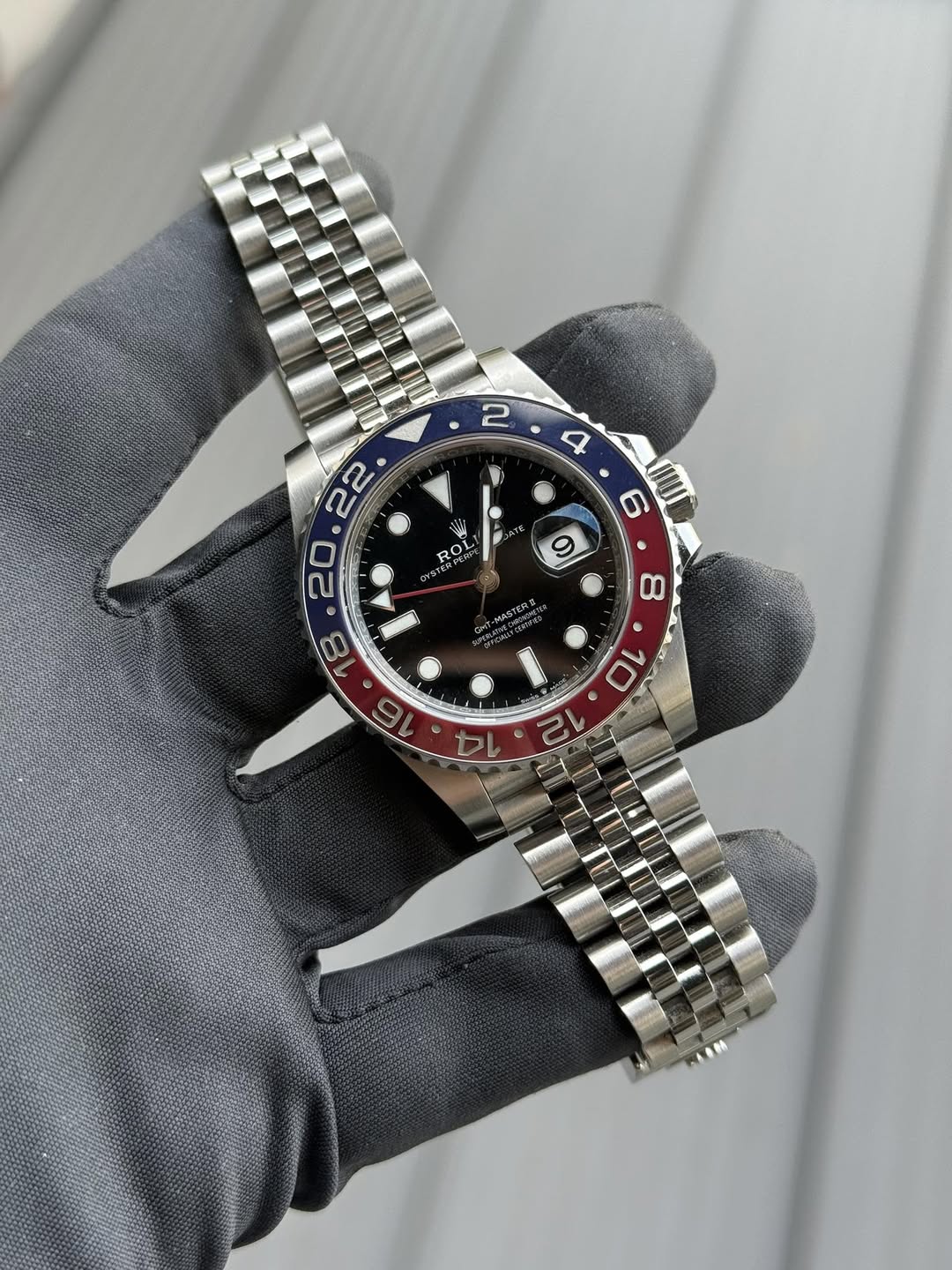 May be an image of wrist watch and text