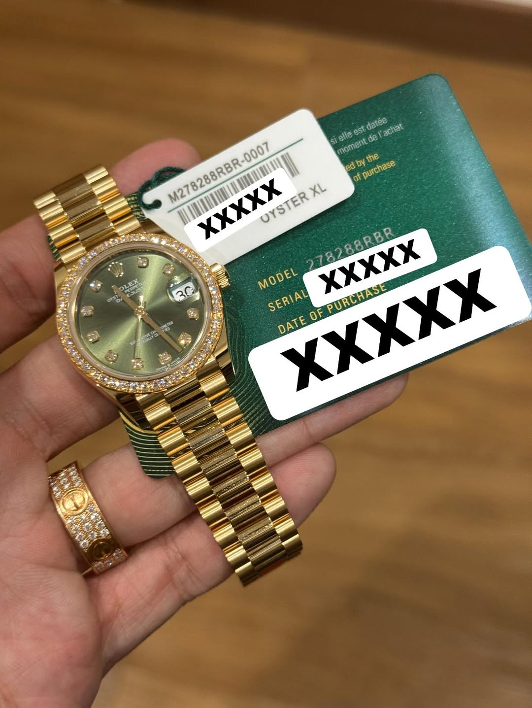 May be an image of wrist watch and text that says 'est datée achat M278288RBR-0007 R-0007 S18 alle est moment de e! ed eO by of purchase the ΧΧχχX UYSTERXL XL UYSTER 78288RBR…