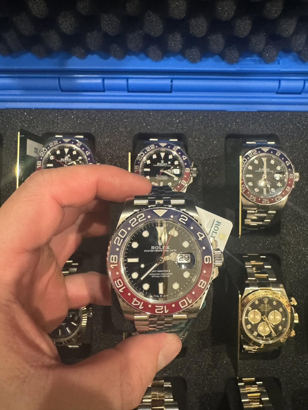 May be an image of wrist watch and text