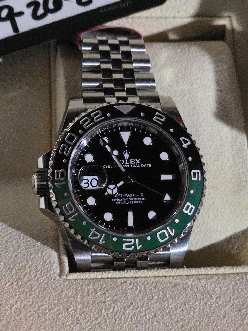 May be an image of wrist watch and text that says '8 10 בח DATE EX TUAL UAL शी PP RP I II REMETER MASTL ERTIFIED LYCERTIFIED GMT GM SEBLAT OYS 30 त'