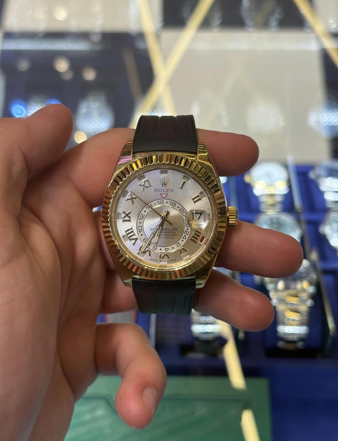 May be an image of wrist watch and text that says 'ROLEX လ X IX 12 • 7 7 VIII vi C X W'