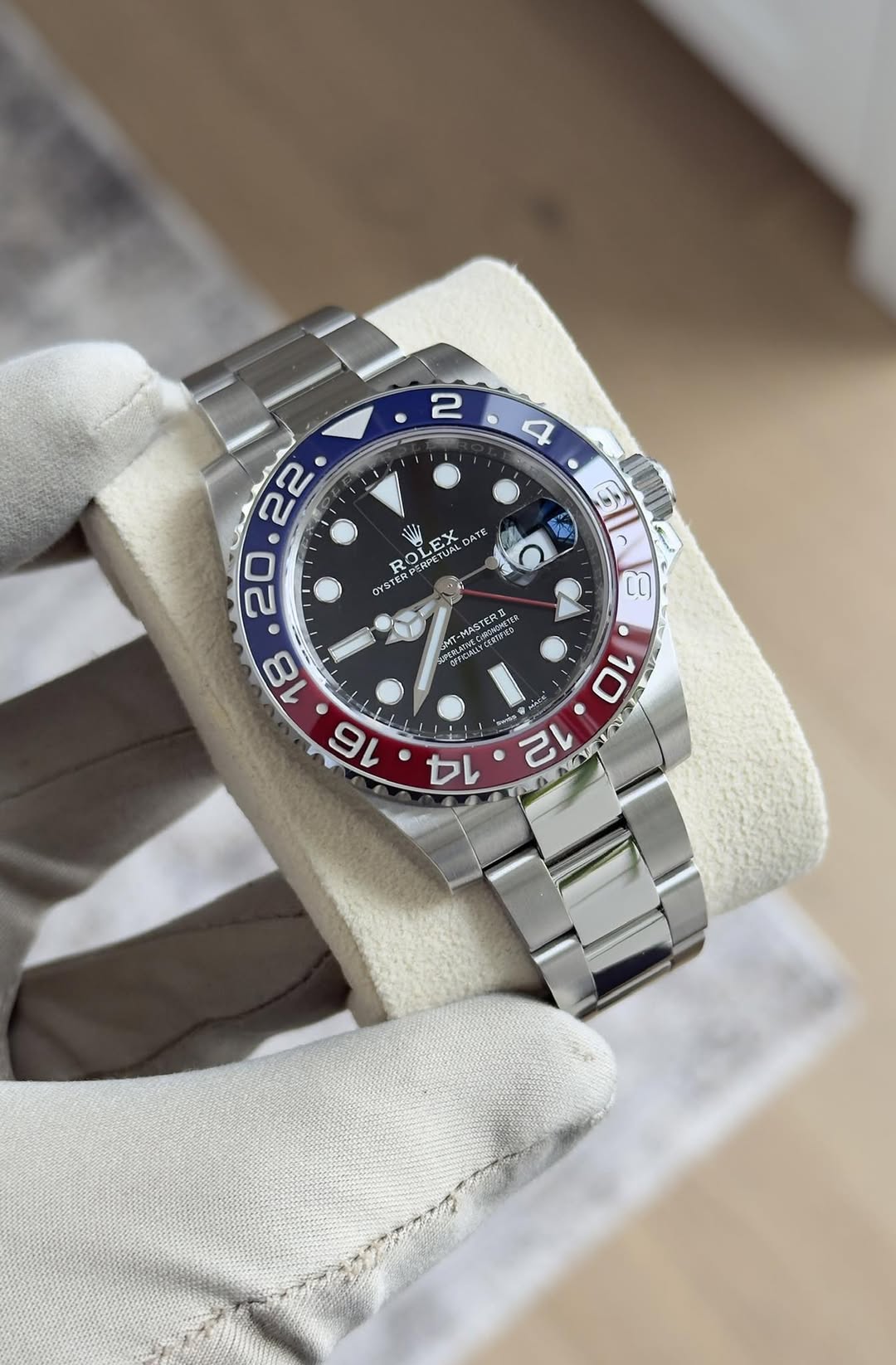 May be an image of wrist watch and text