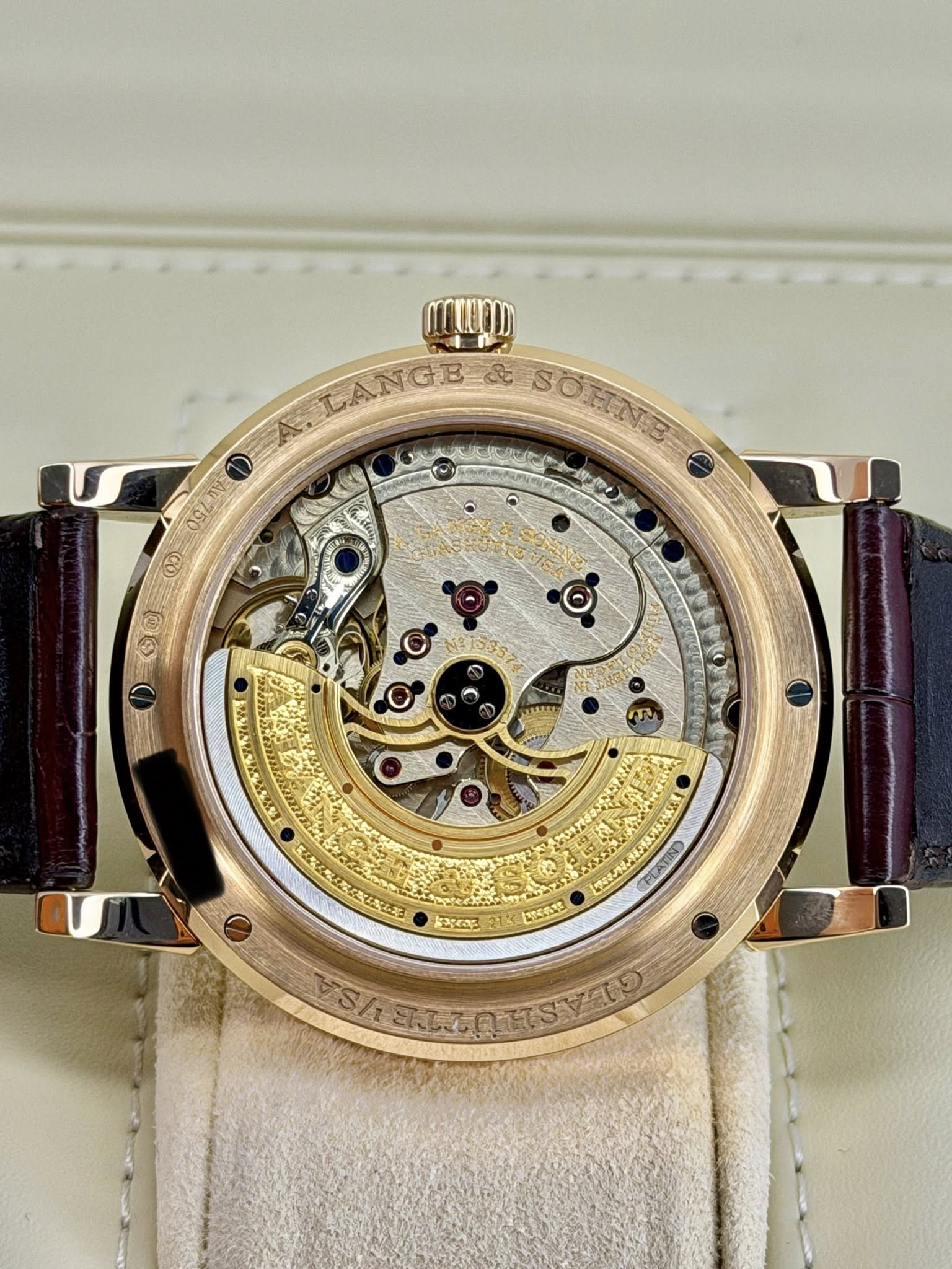 May be an image of wrist watch and text