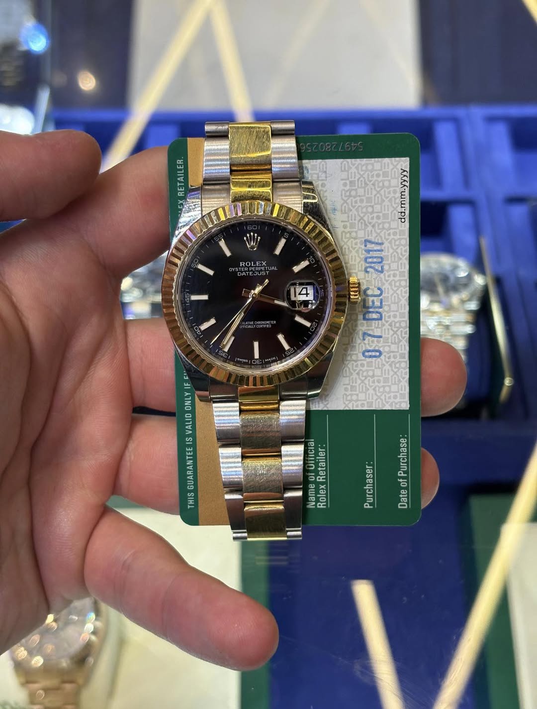 May be an image of wrist watch and text that says '4 ж KKKK-wwpp 2007 แวม์ ញ 3300 ONLY VALID IS มาอ TIHT Retanler Belay Rolex Rolex Purchase: of Date Purchaser'