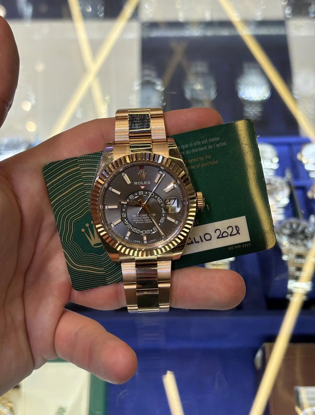 May be an image of wrist watch and text that says 'ROLEX 12 2 4 ن 75 O 22 แกั D DE '