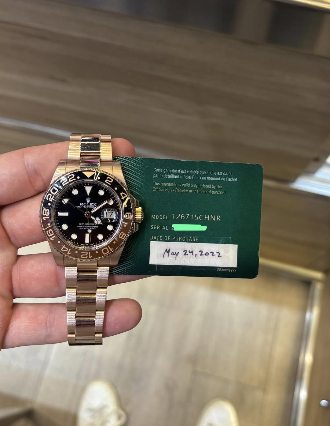 May be an image of wrist watch and text
