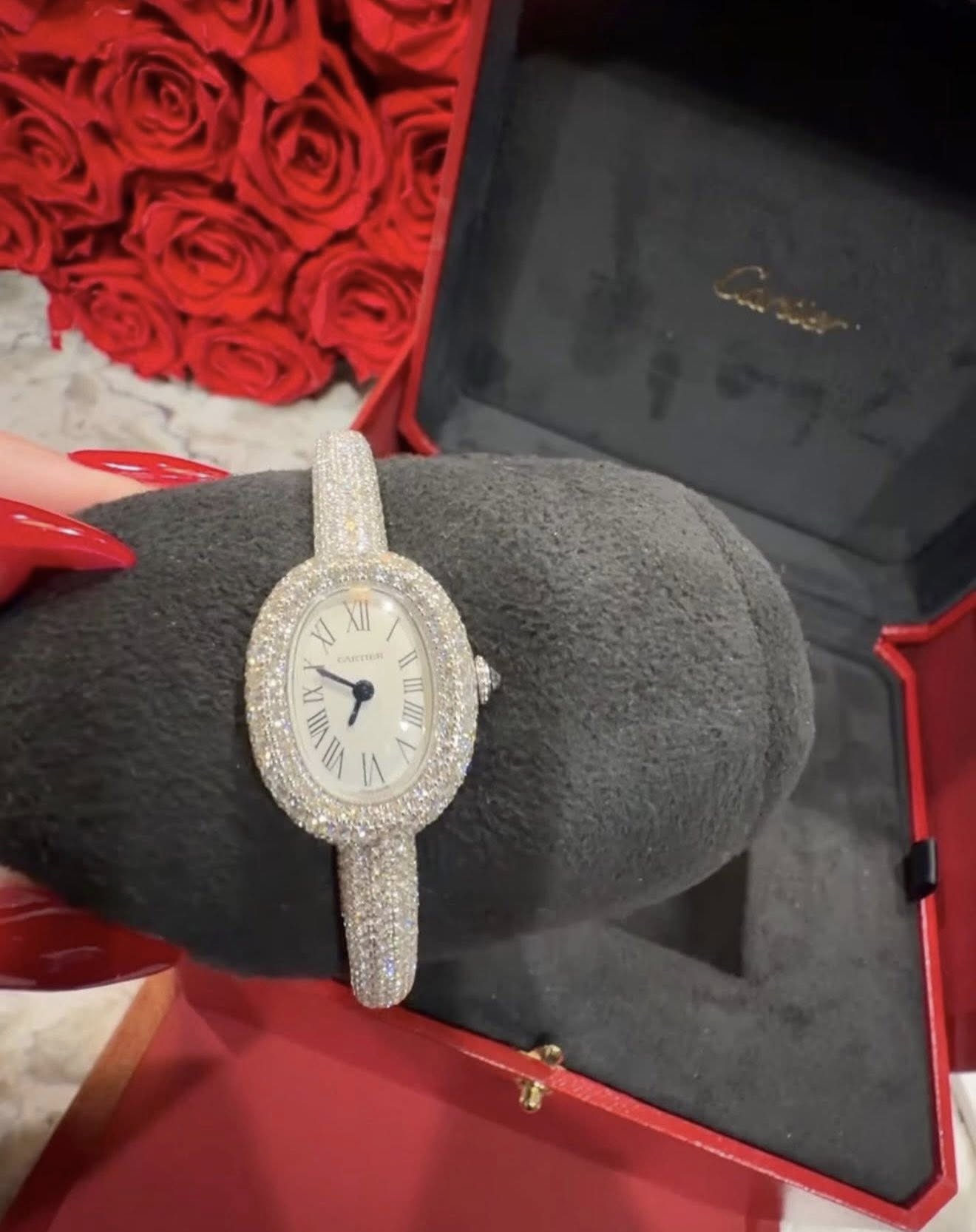May be an image of wrist watch and text