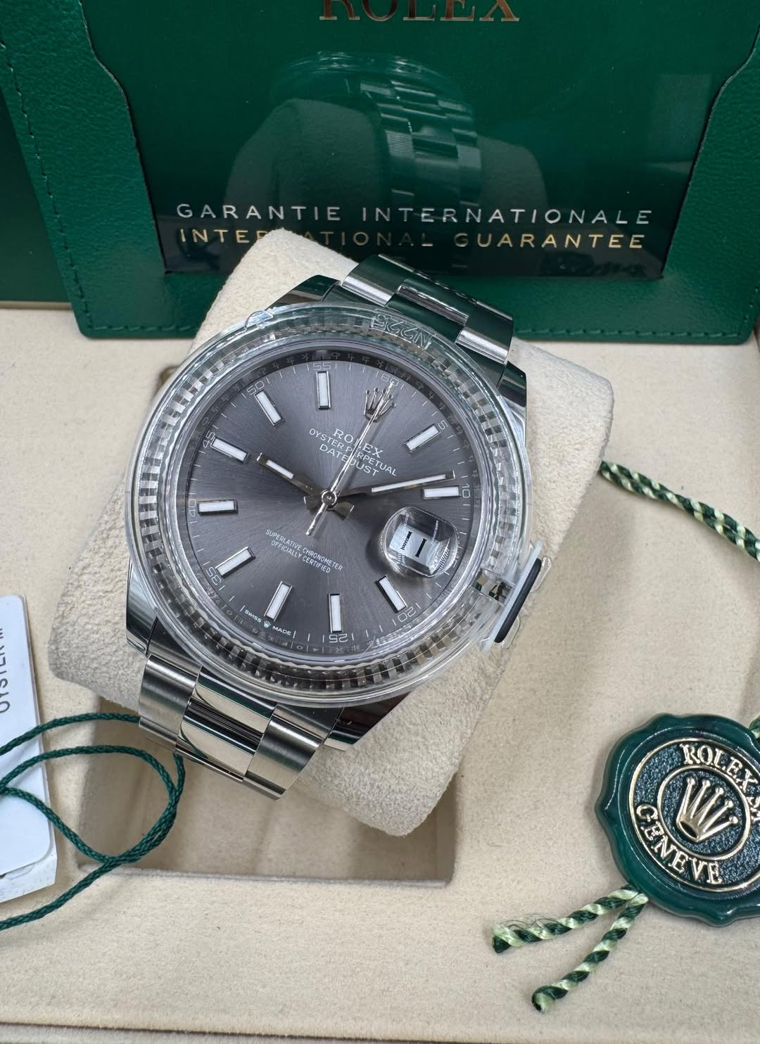 May be an image of wrist watch and text