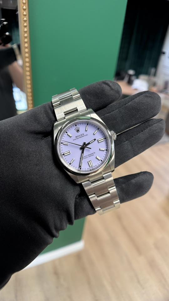 May be an image of wrist watch