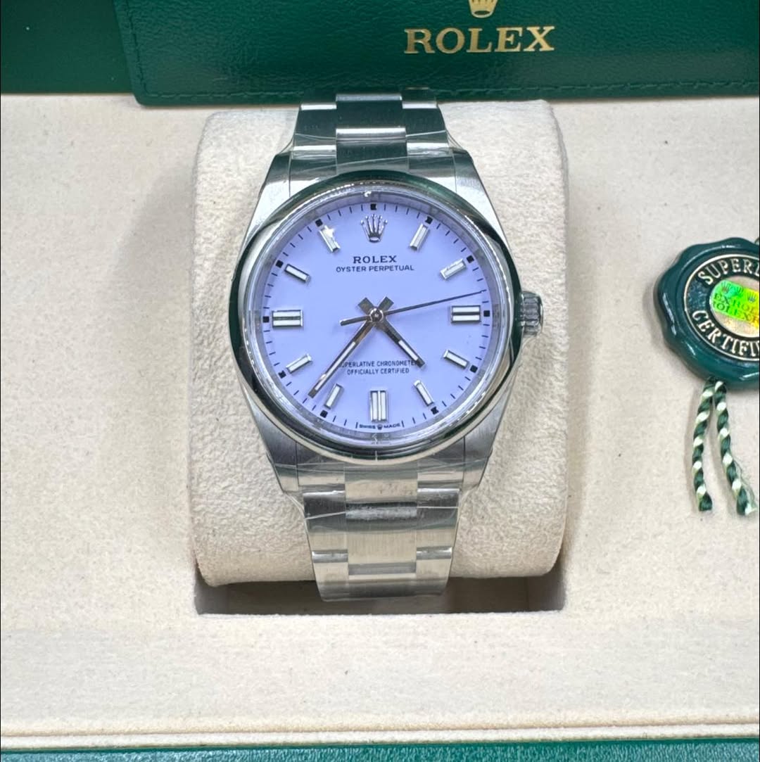 May be an image of wrist watch and text that says 'ROLEX ROLEX OYST PERPETUAL E RPETUAL UAL 1 III - OFFICIALLY HITFED SU SUPER ER CEtMES CERTIFL V 9'