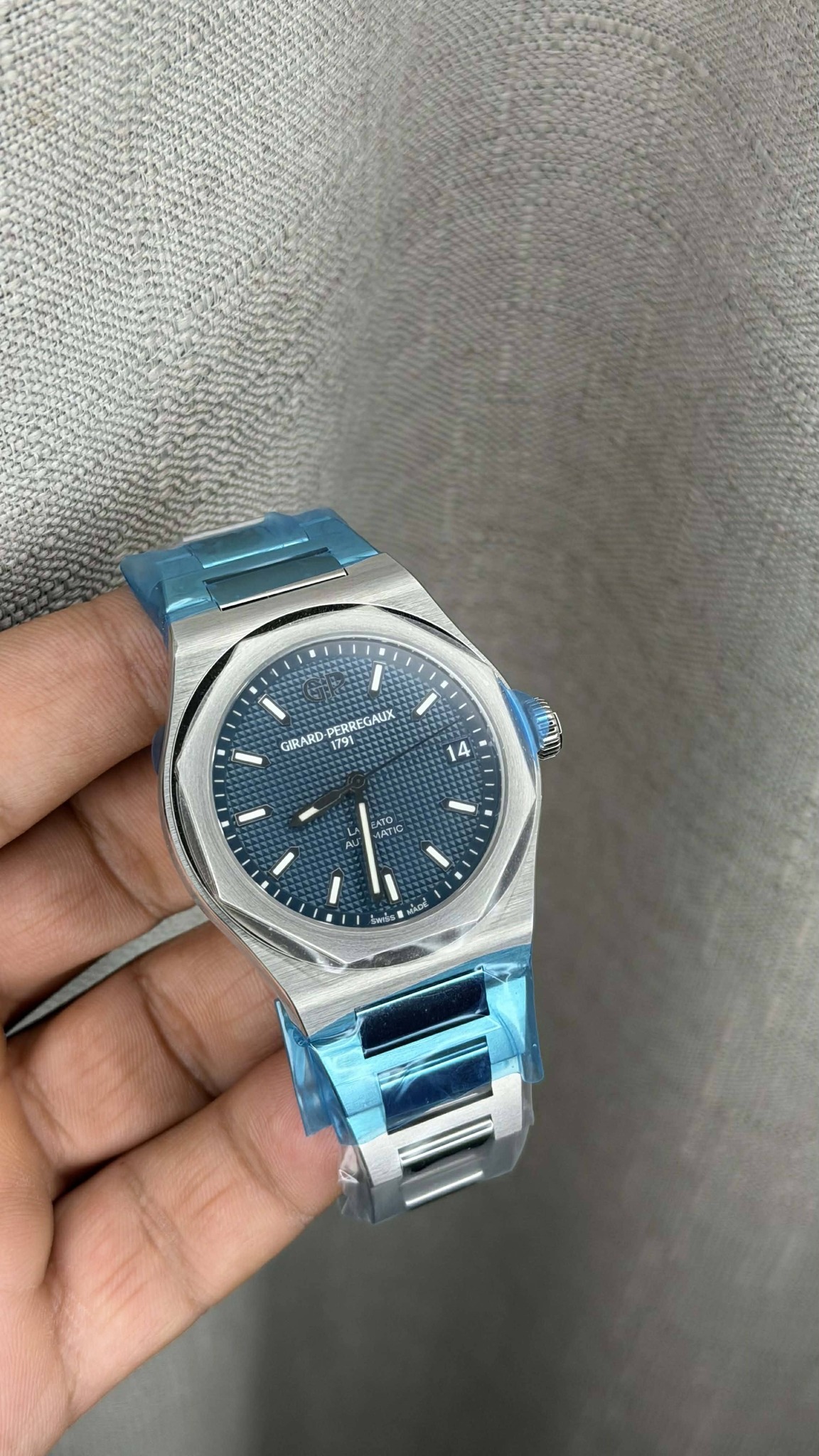 May be an image of digital watch and text