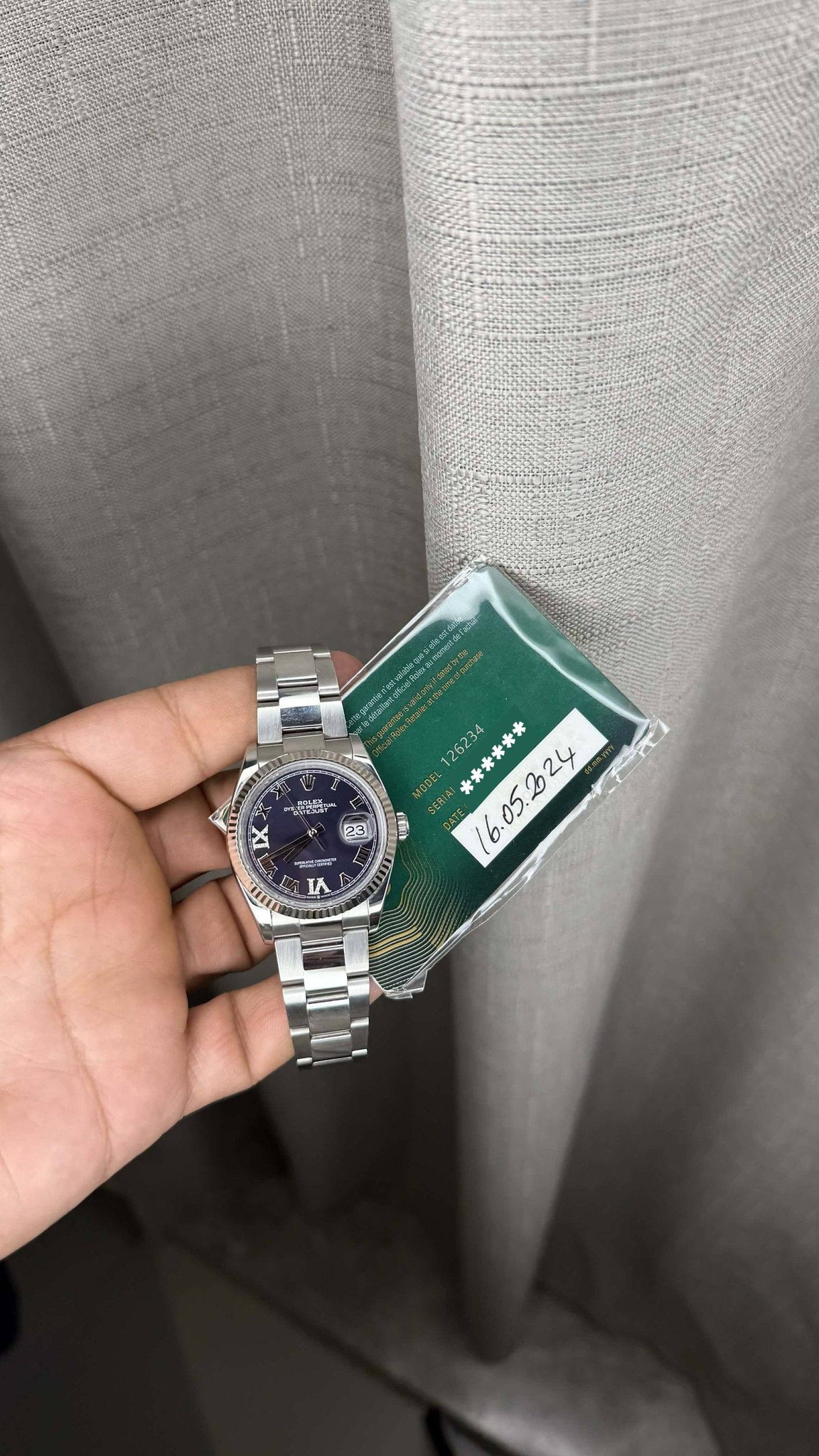 May be an image of digital watch and text