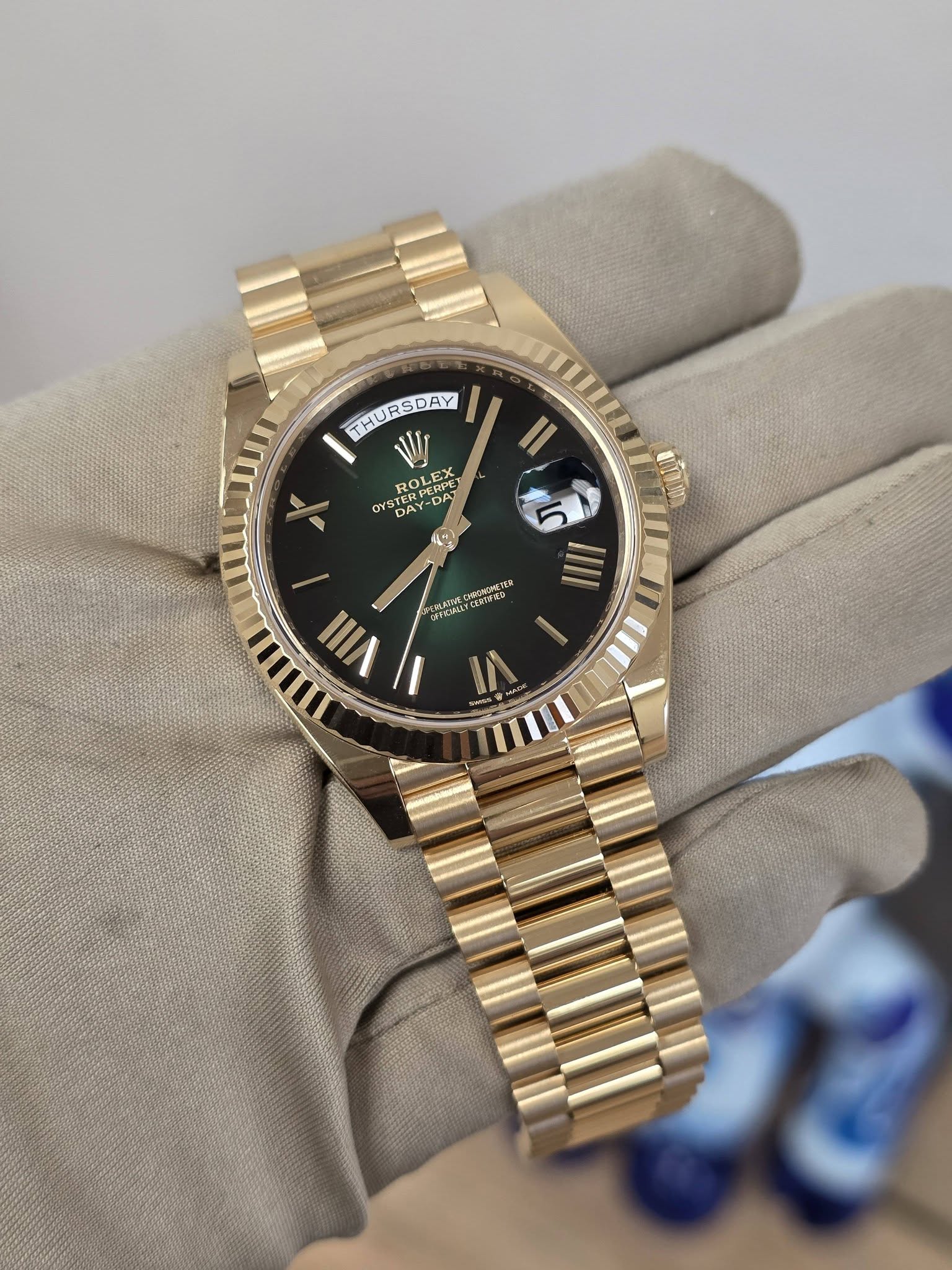 May be an image of wrist watch and text