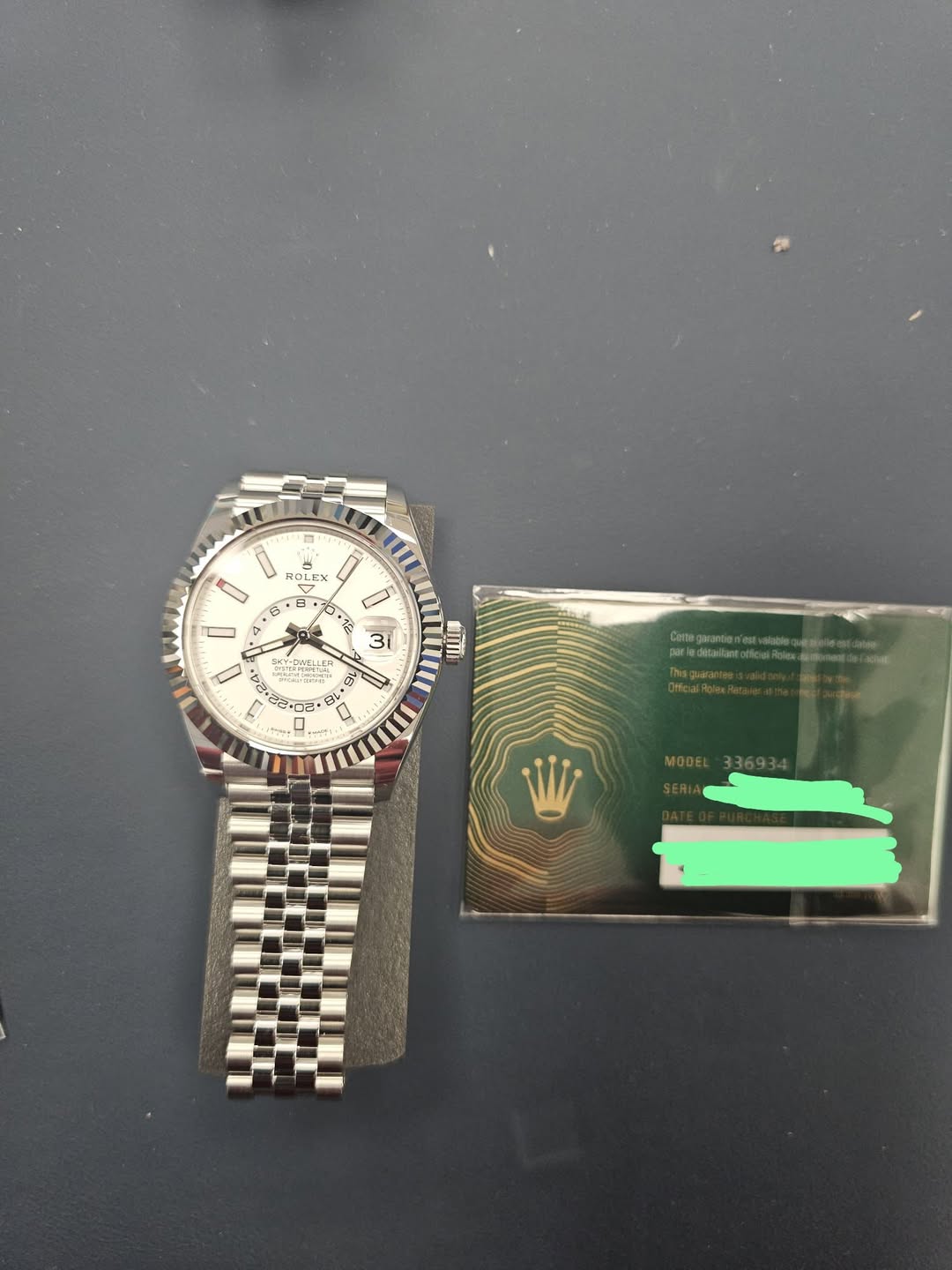 May be an image of wrist watch and text