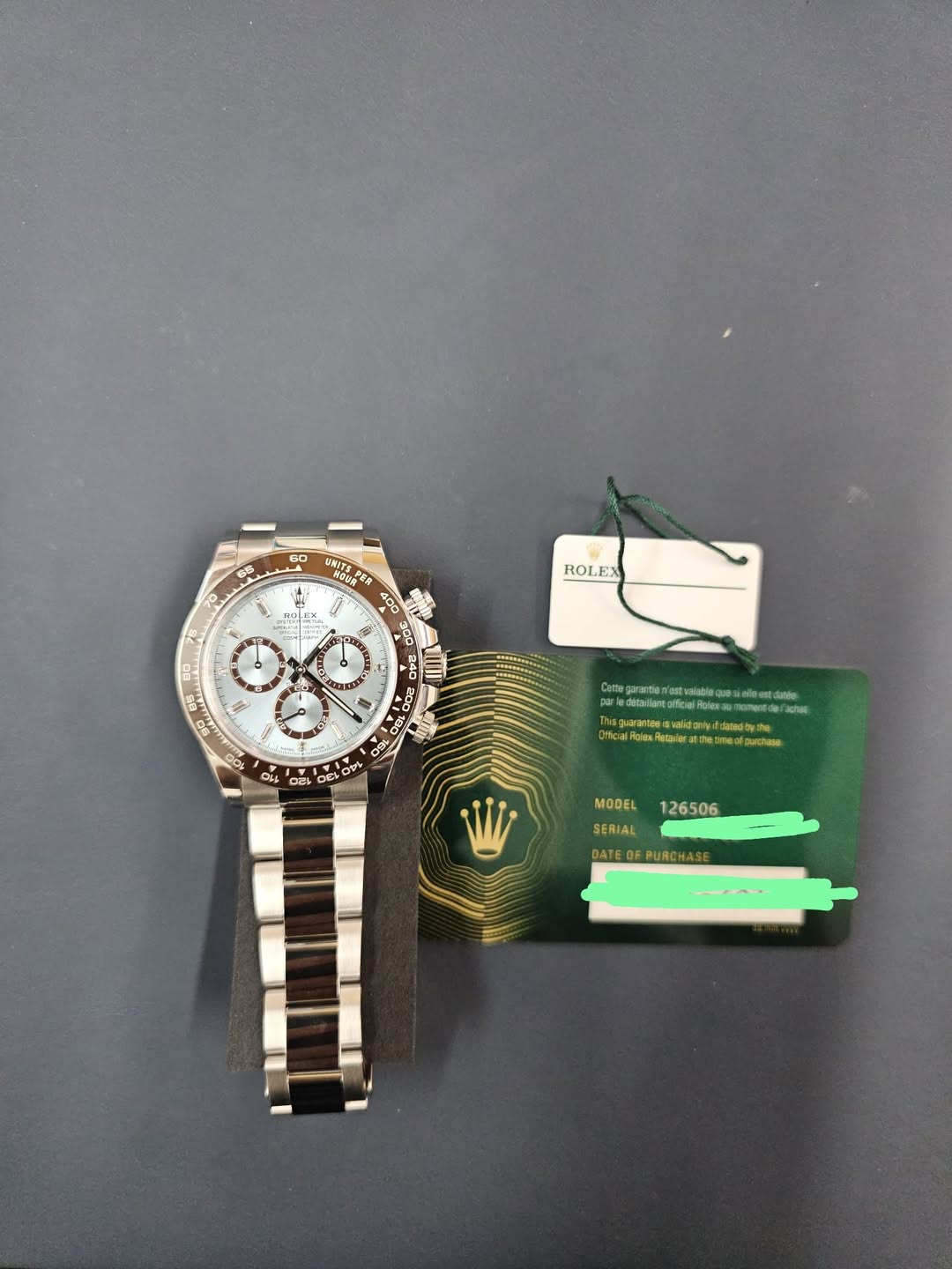 May be an image of wrist watch and text