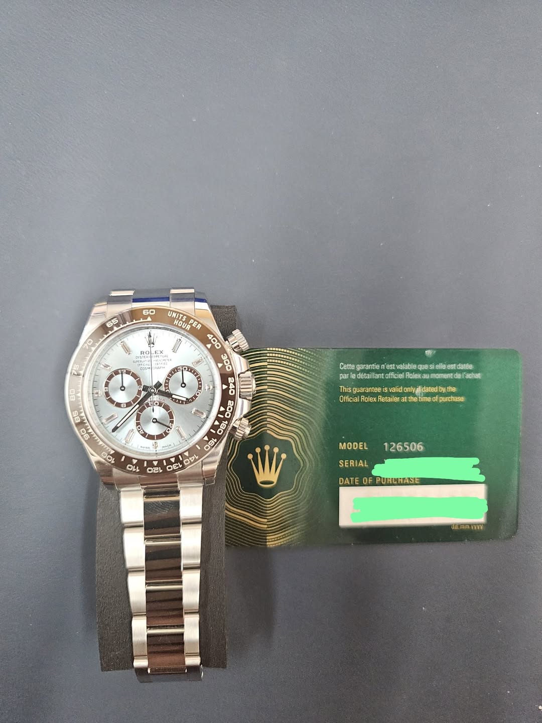 May be an image of wrist watch and text