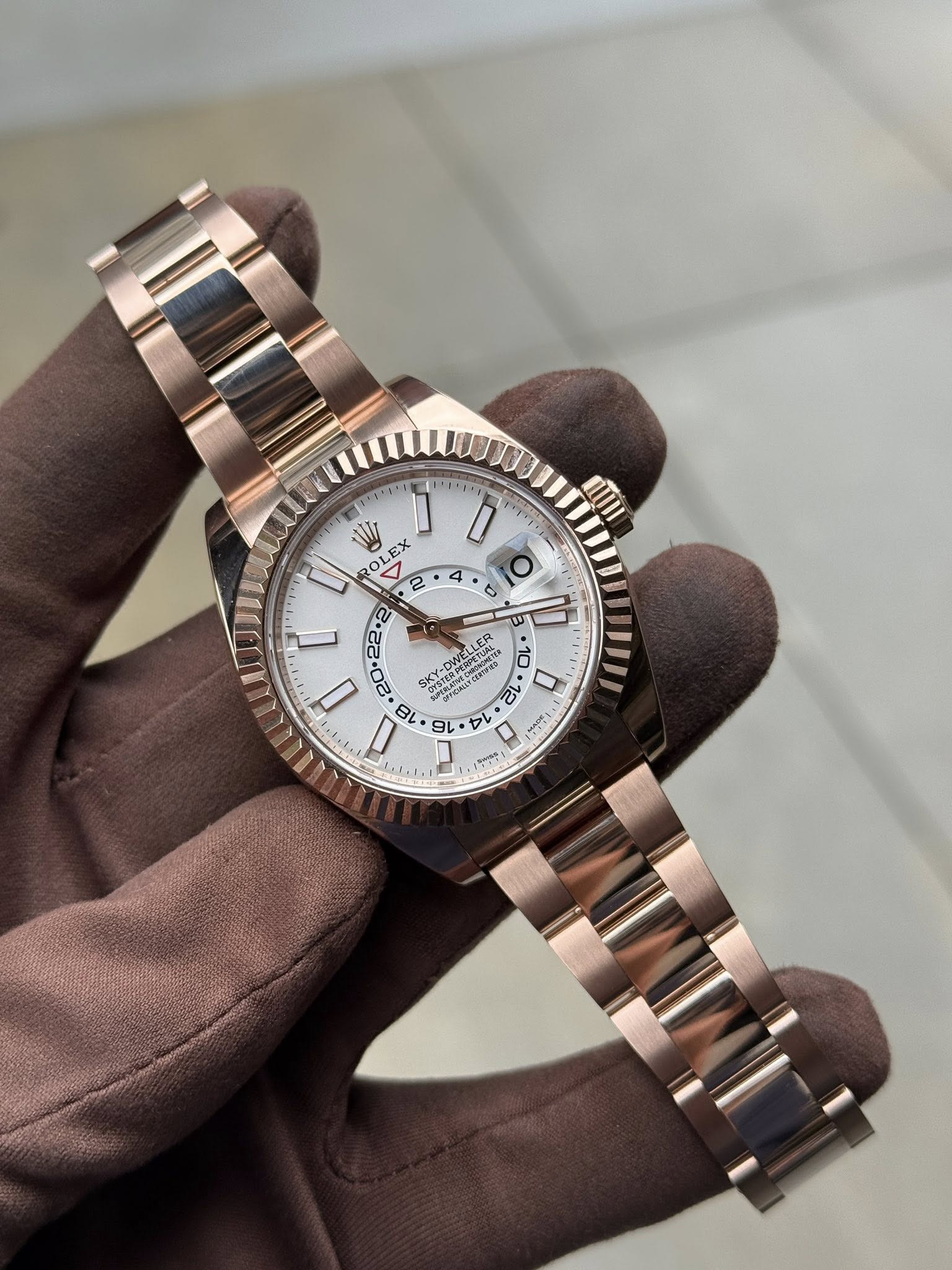 May be an image of wrist watch and text