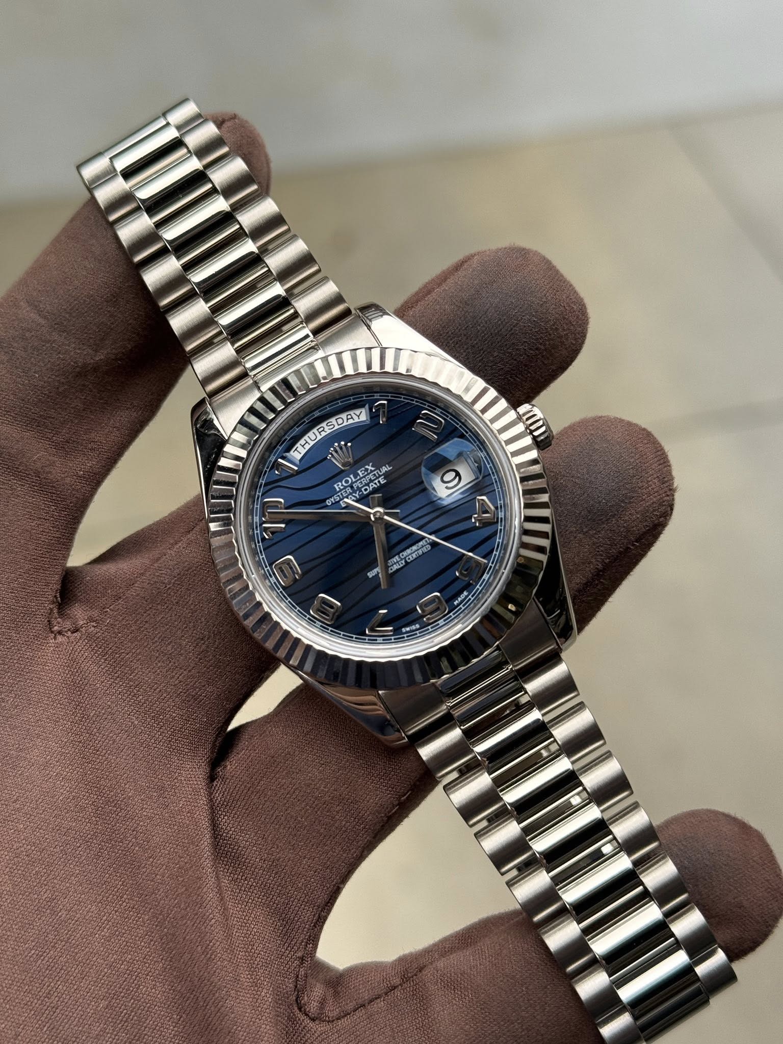 May be an image of wrist watch and text that says 'A h 9 U'