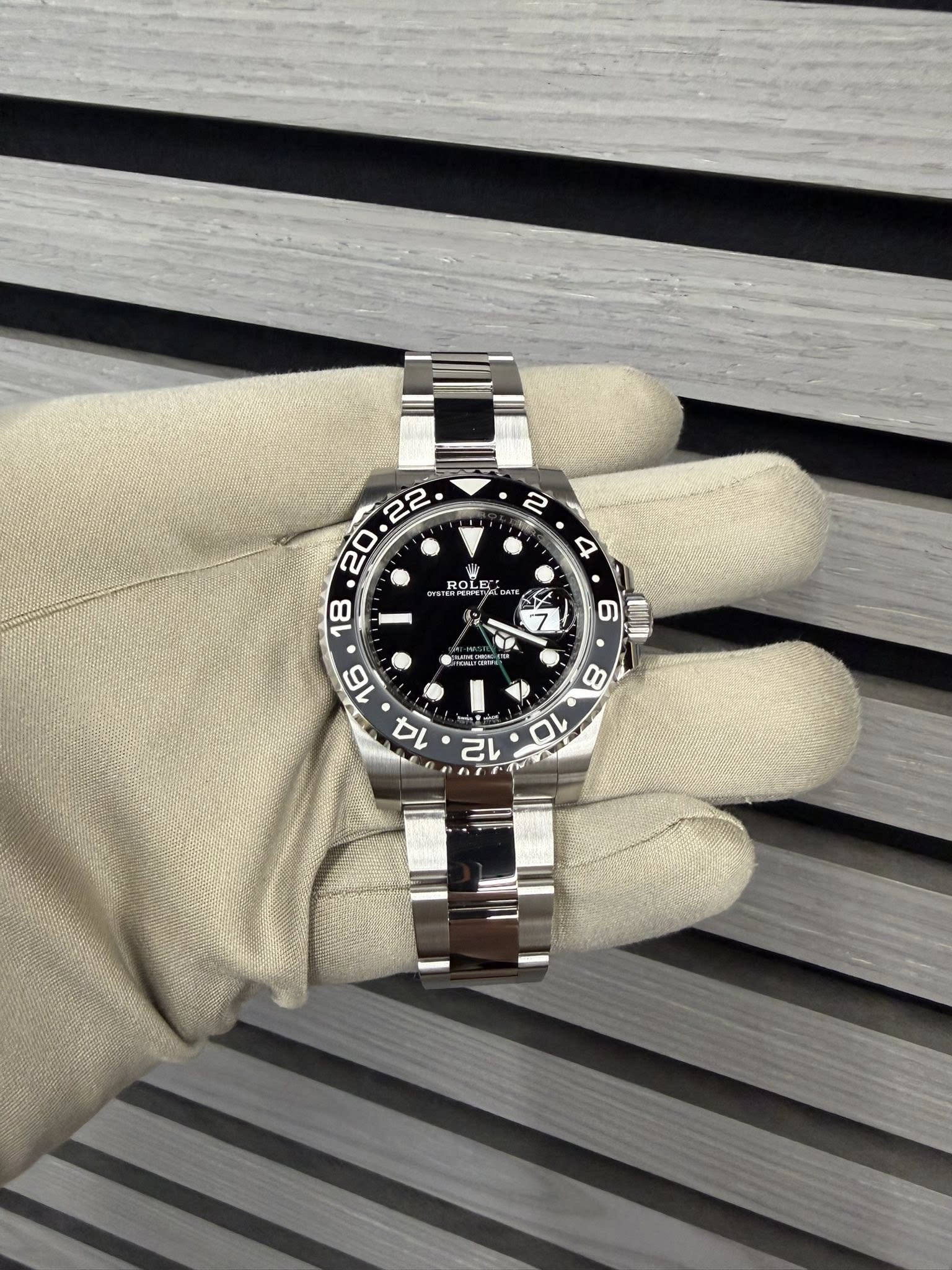 May be an image of wrist watch and text