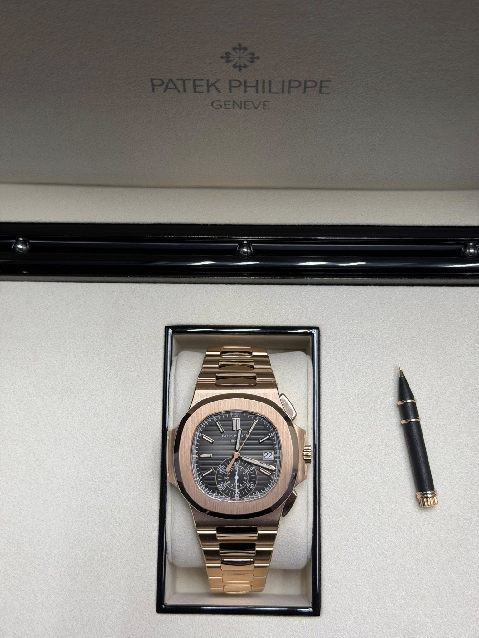 May be an image of wrist watch and text