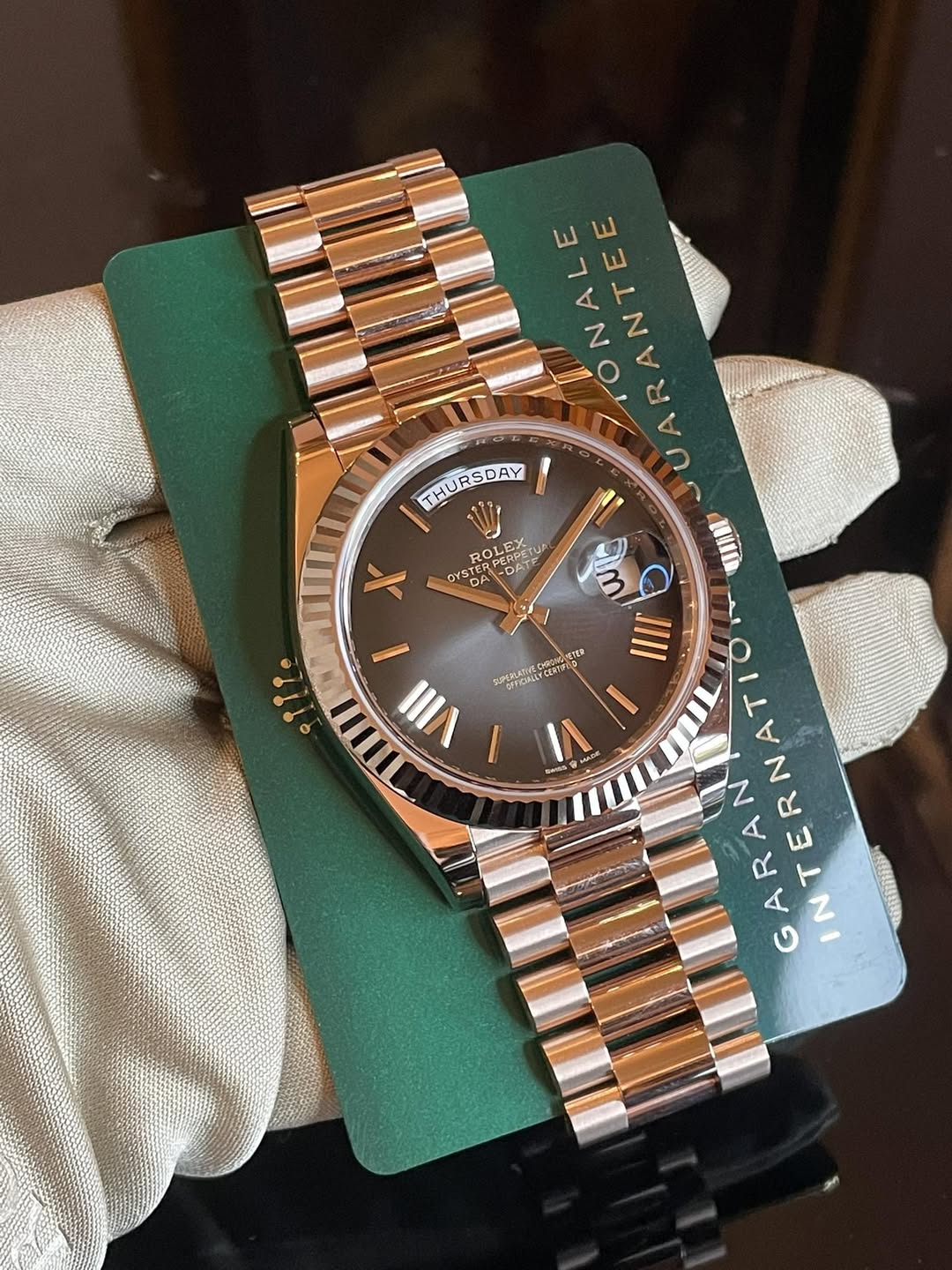 May be an image of wrist watch and text