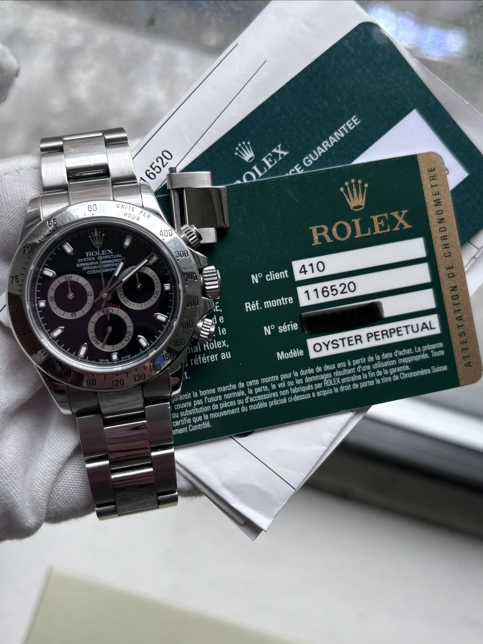 May be an image of wrist watch and text that says 'PS 6520 60 UNITS HOUA E OLEX GUARANTEE 400 300 N° client Réf. montre N° série Rolex, érer au aborne marche sYusute PERPETUAL…
