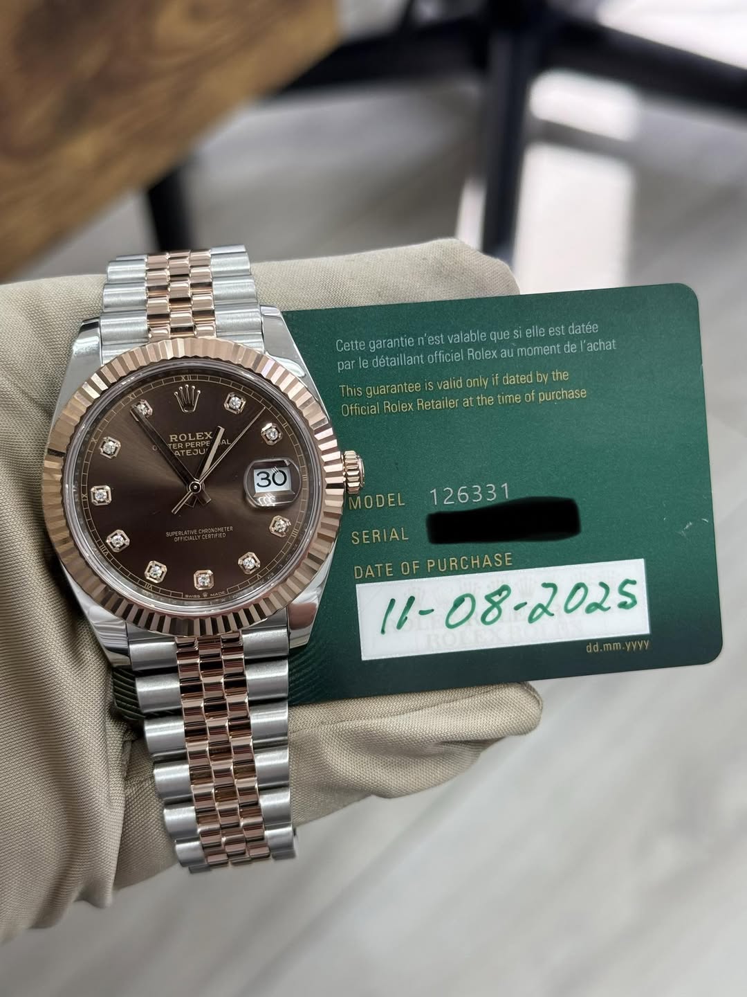 May be an image of wrist watch and text