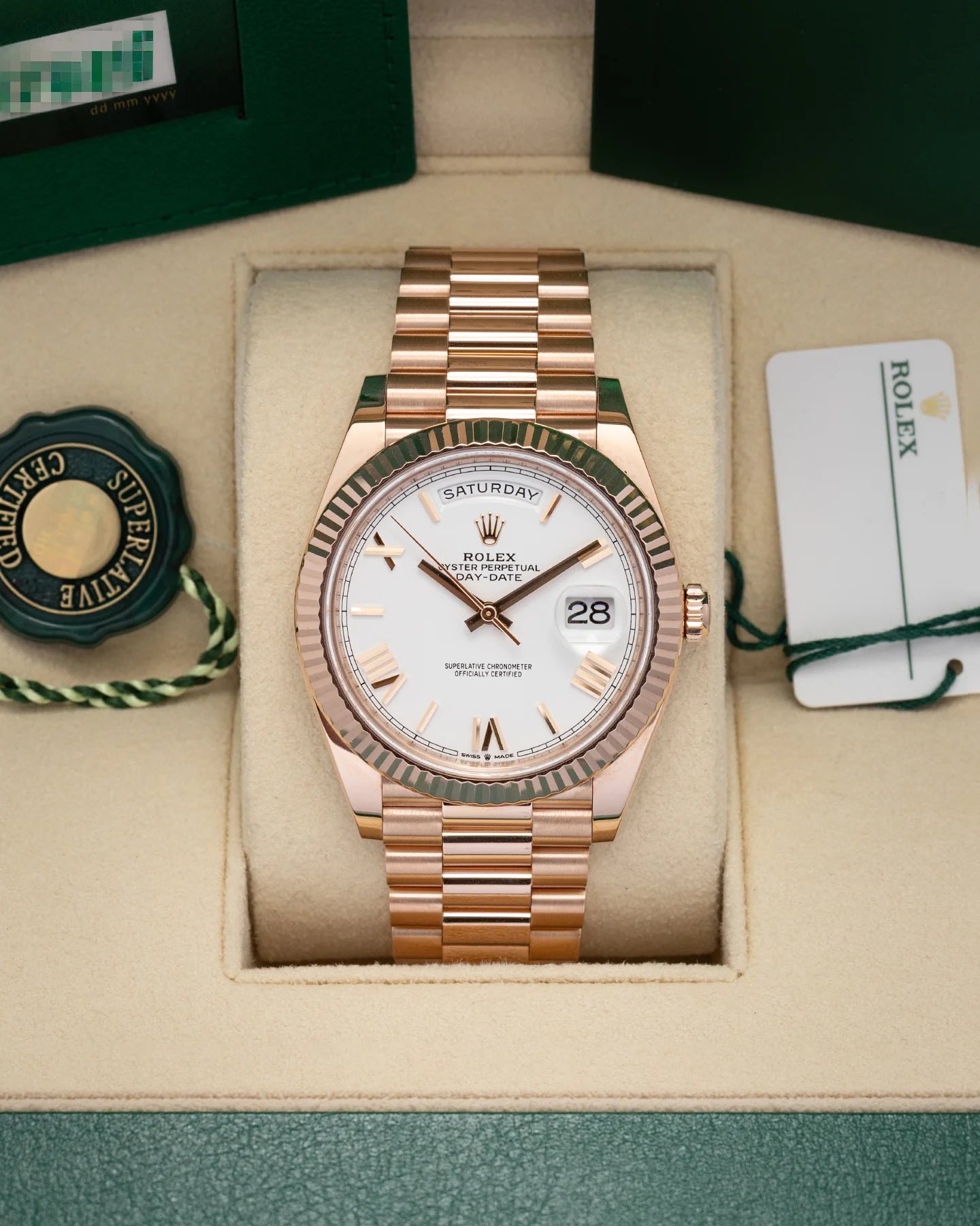 May be an image of wrist watch and text