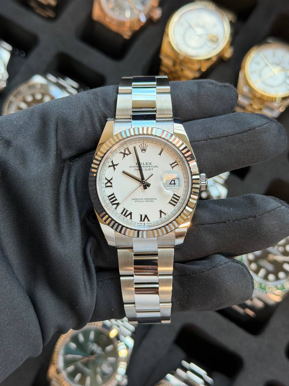 May be an image of wrist watch and text
