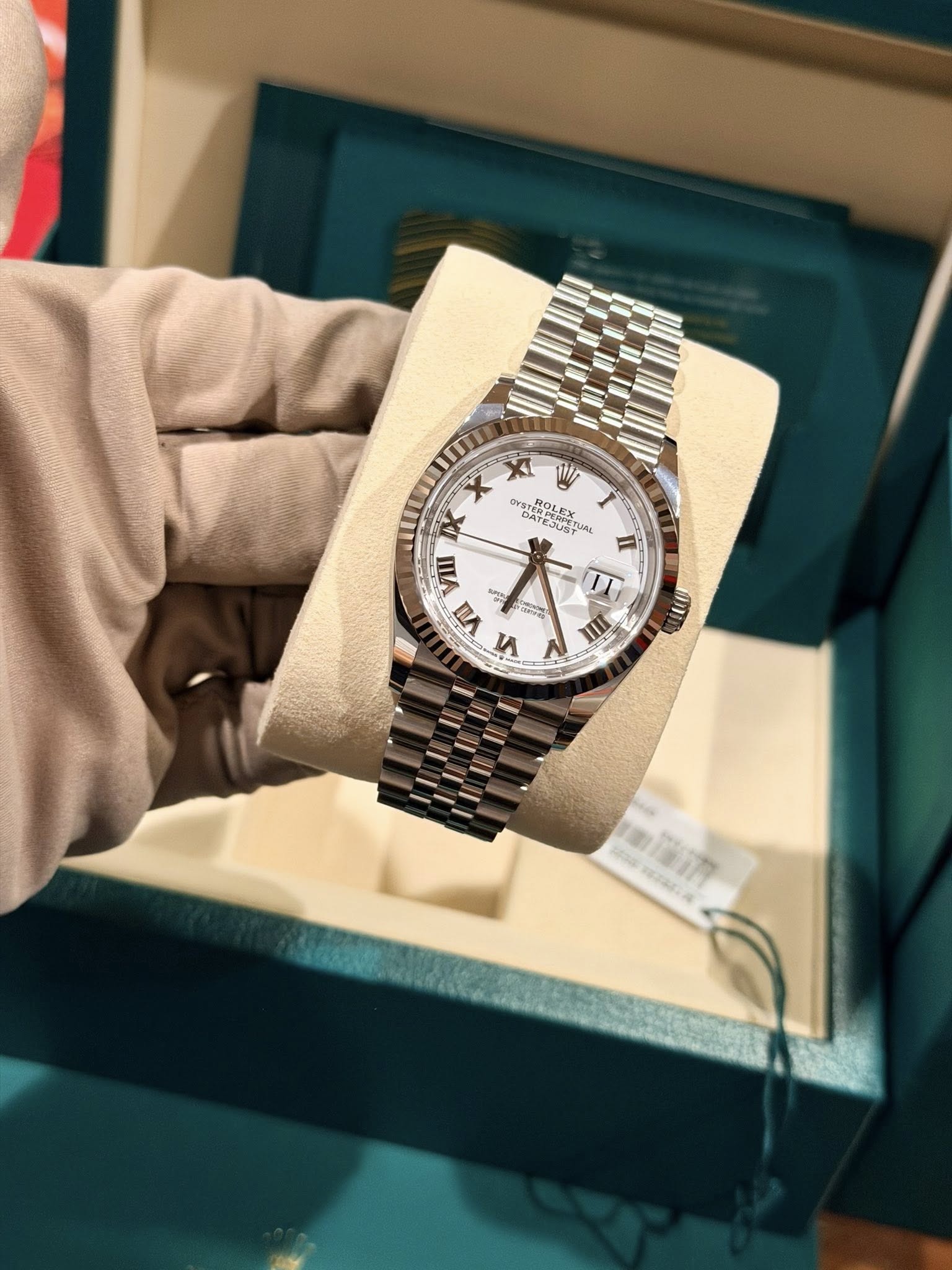 May be an image of wrist watch and text