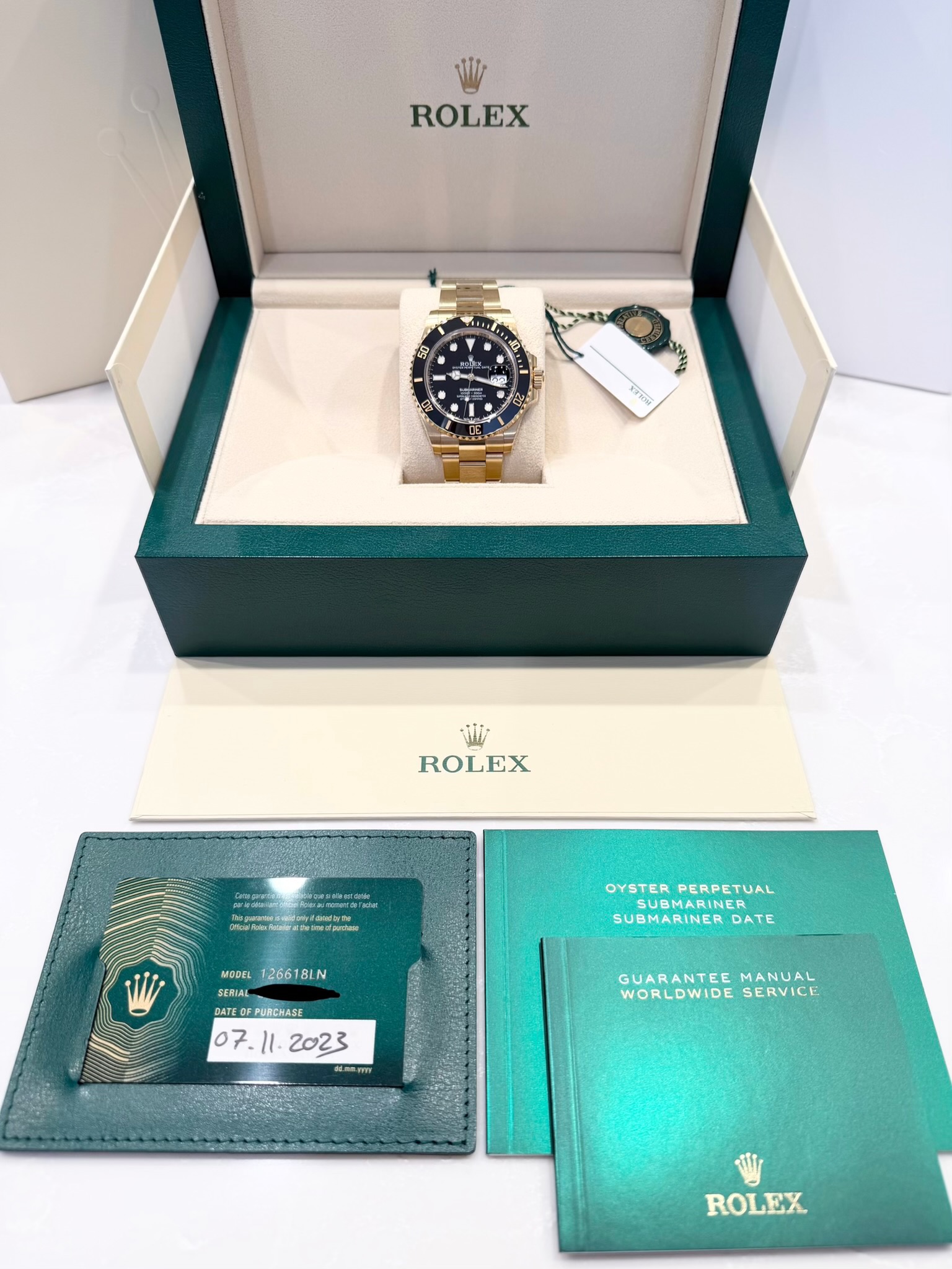 May be an image of wrist watch and text that says 'ROLEX 14? 시균 ኢትትዮዮ SERO ili ROLEX 126618LN LN 12661 OYSTERPERPETUAL OYSTER PERPETUAL SUBMARINER DATE MODEL SENIAL DATED…