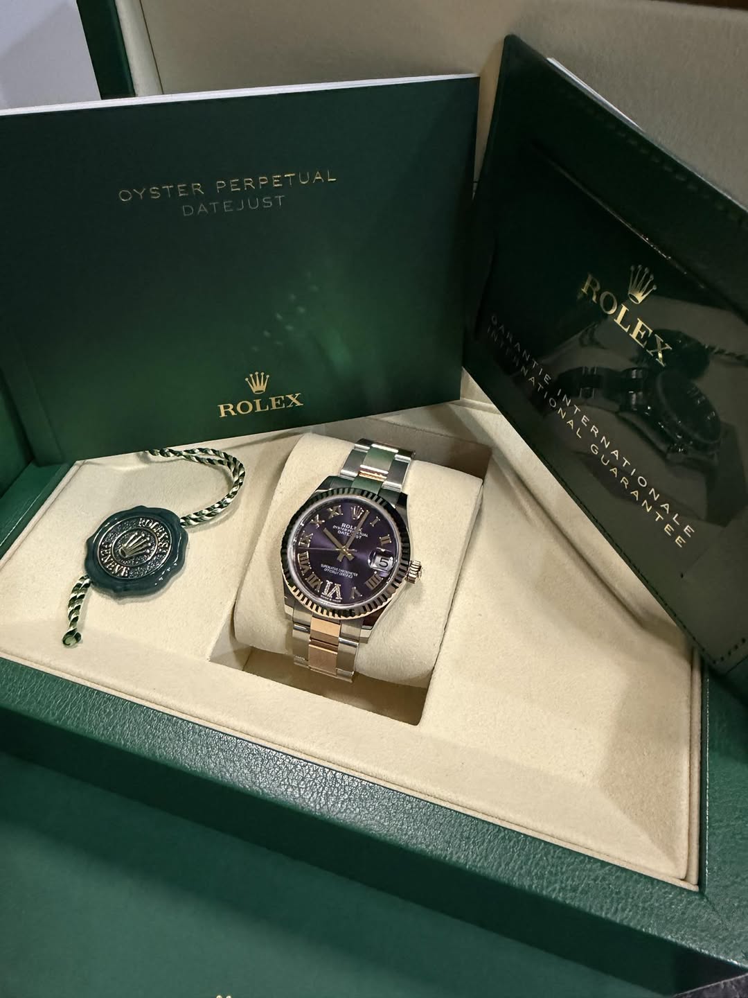 May be an image of wrist watch and text