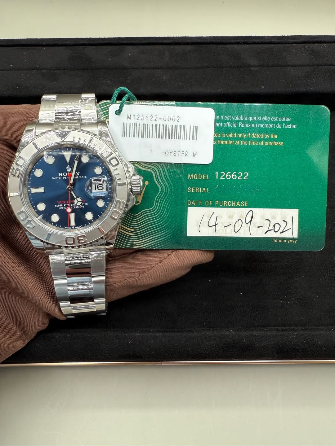 May be an image of wrist watch and text