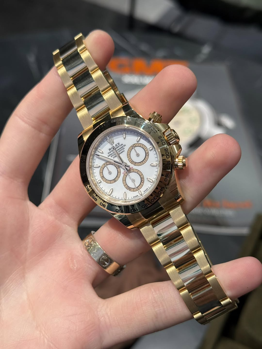 May be an image of wrist watch and text