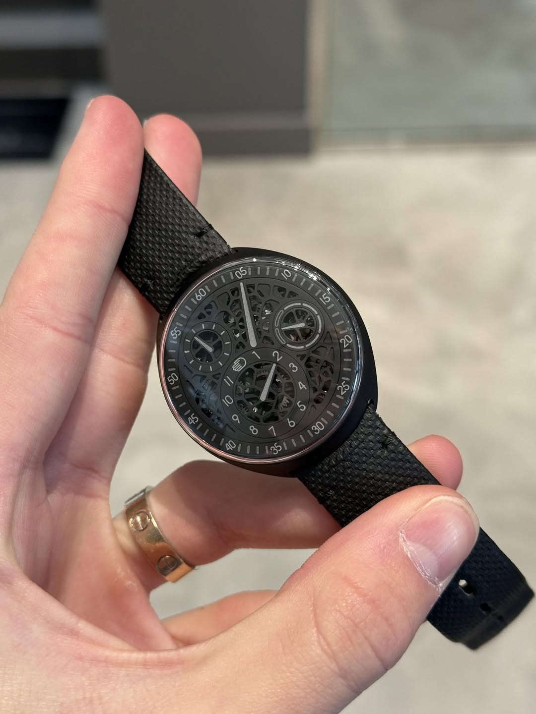 May be an image of wrist watch and text
