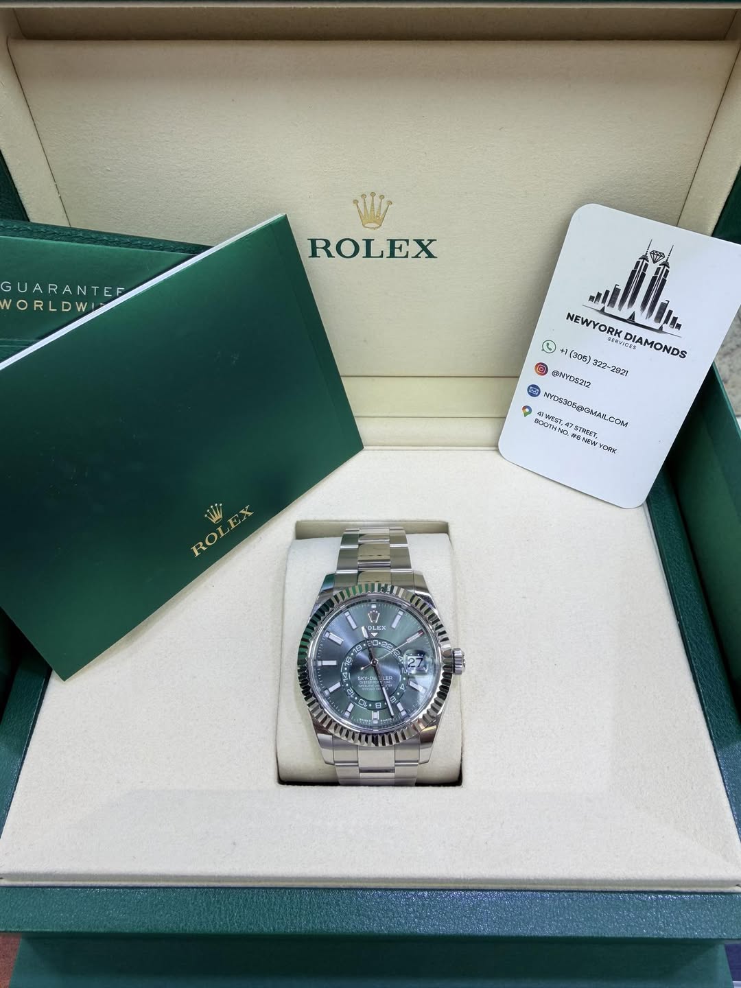 May be an image of wrist watch and text