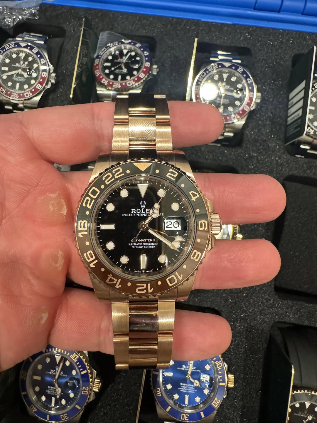 May be an image of wrist watch and text