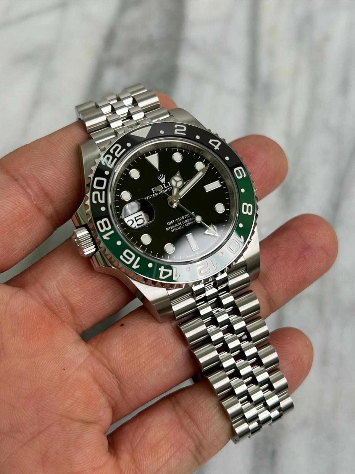 May be an image of wrist watch and text