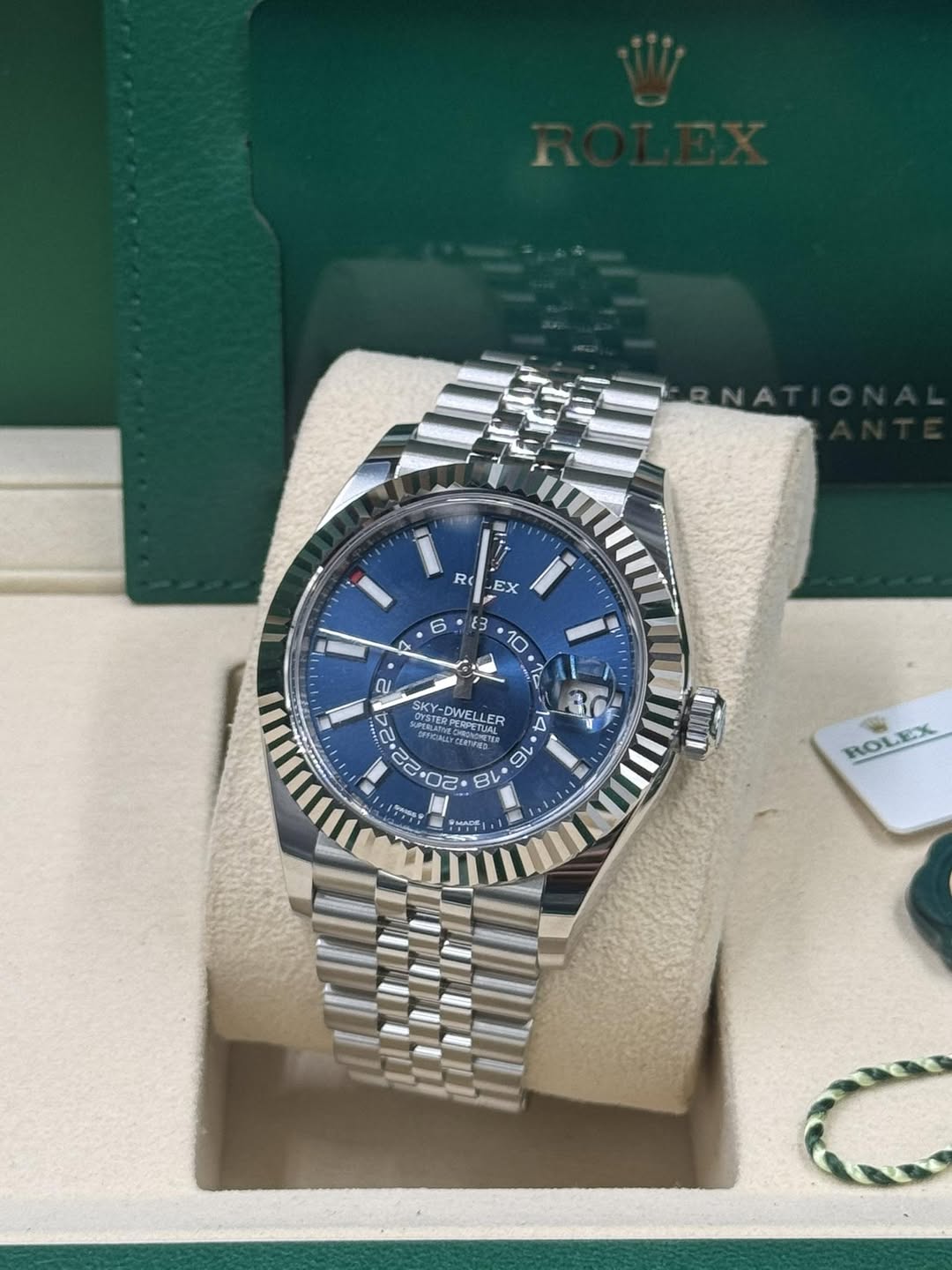 May be an image of wrist watch and text