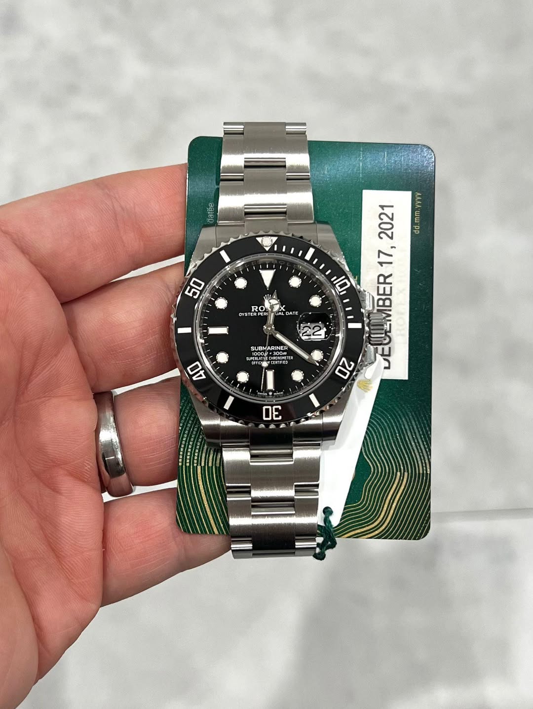 May be an image of wrist watch and text